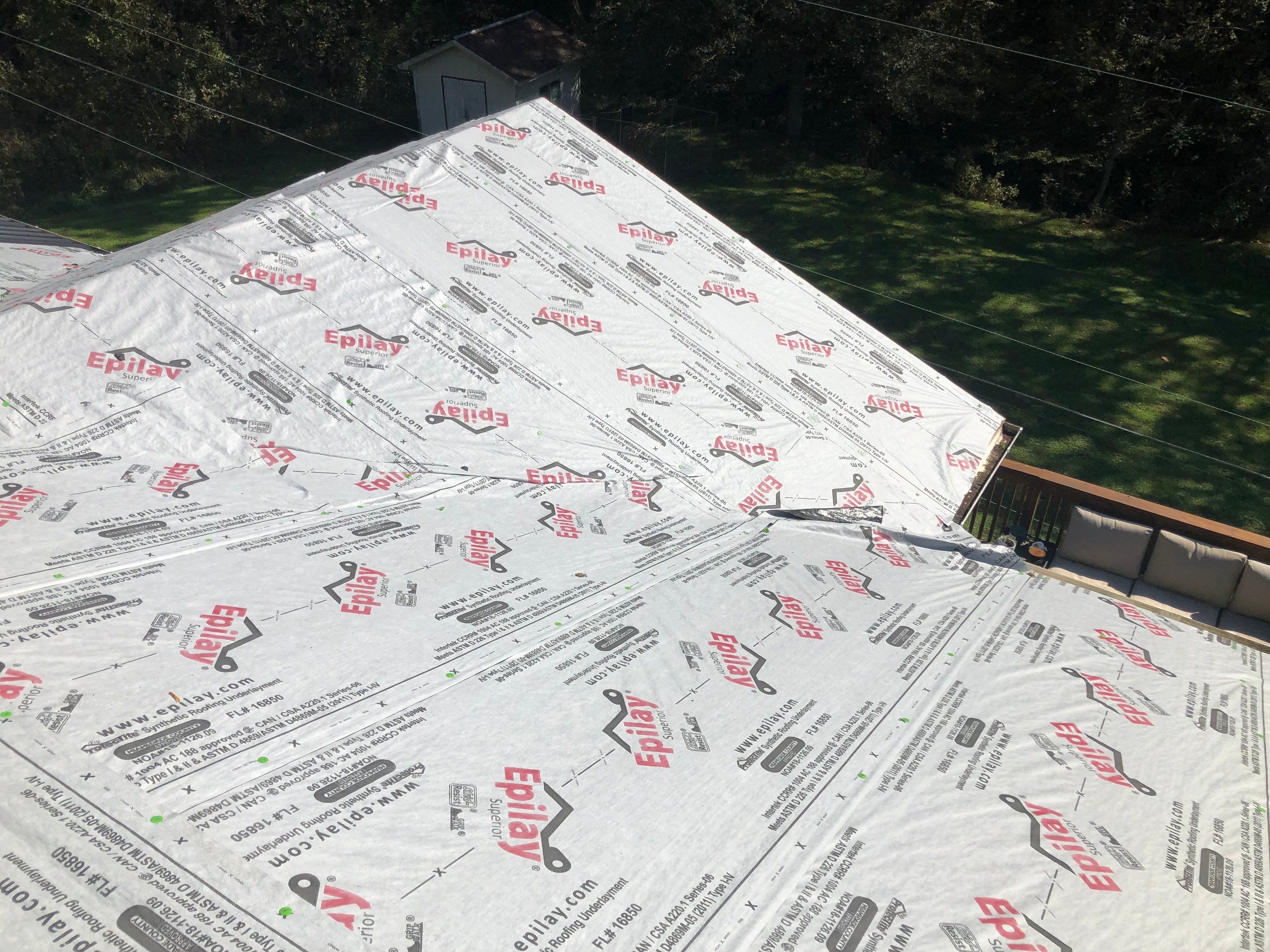 Metal Roof and Vinyl Siding, Soffit, Gutters using LifeTite Premium metal roofing  by Secure Construction Company Inc