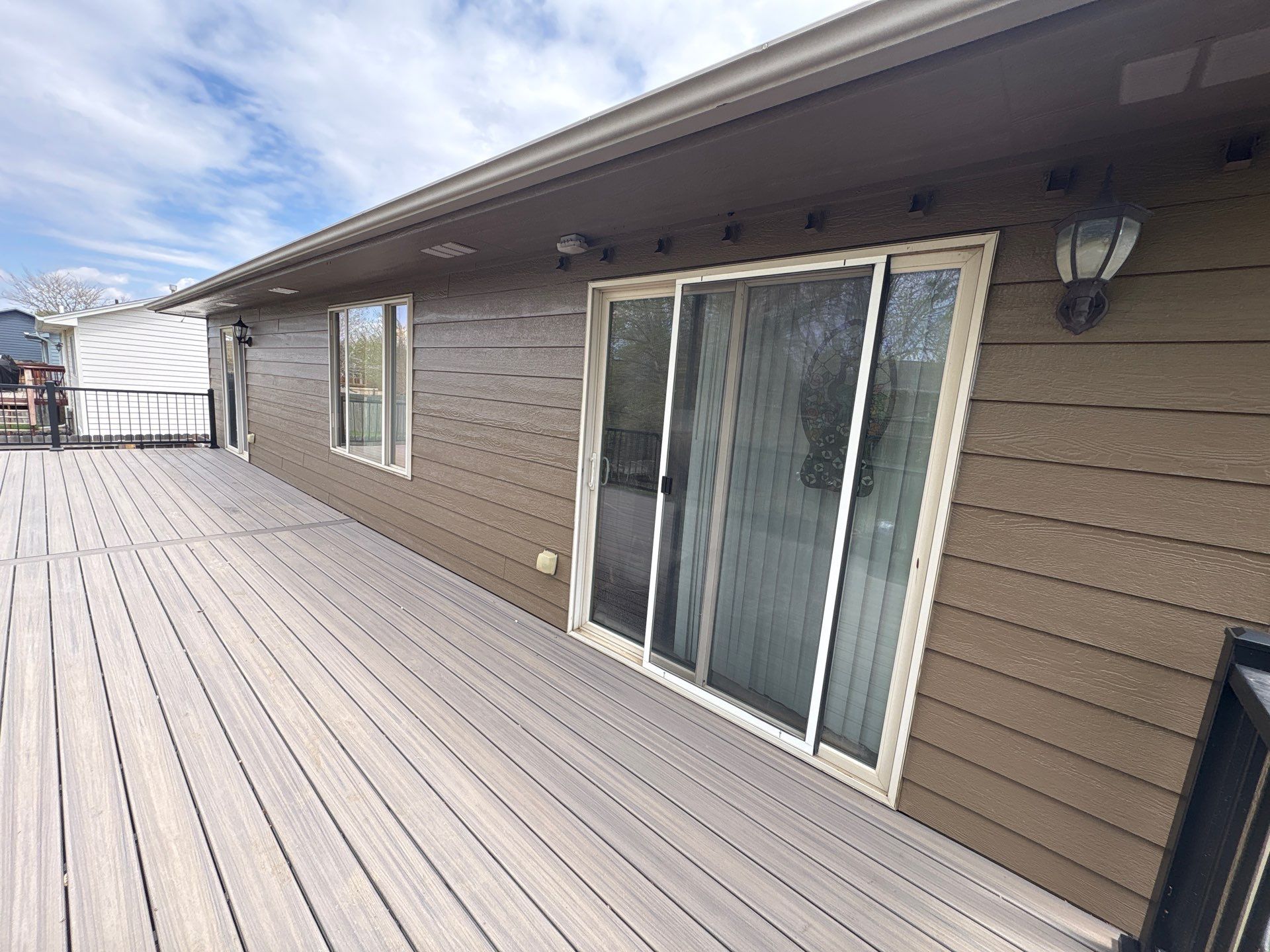 Exterior Painting and Wood Trim Replacement in Sioux Falls by Select Painting, Coatings & Garage Cabinets