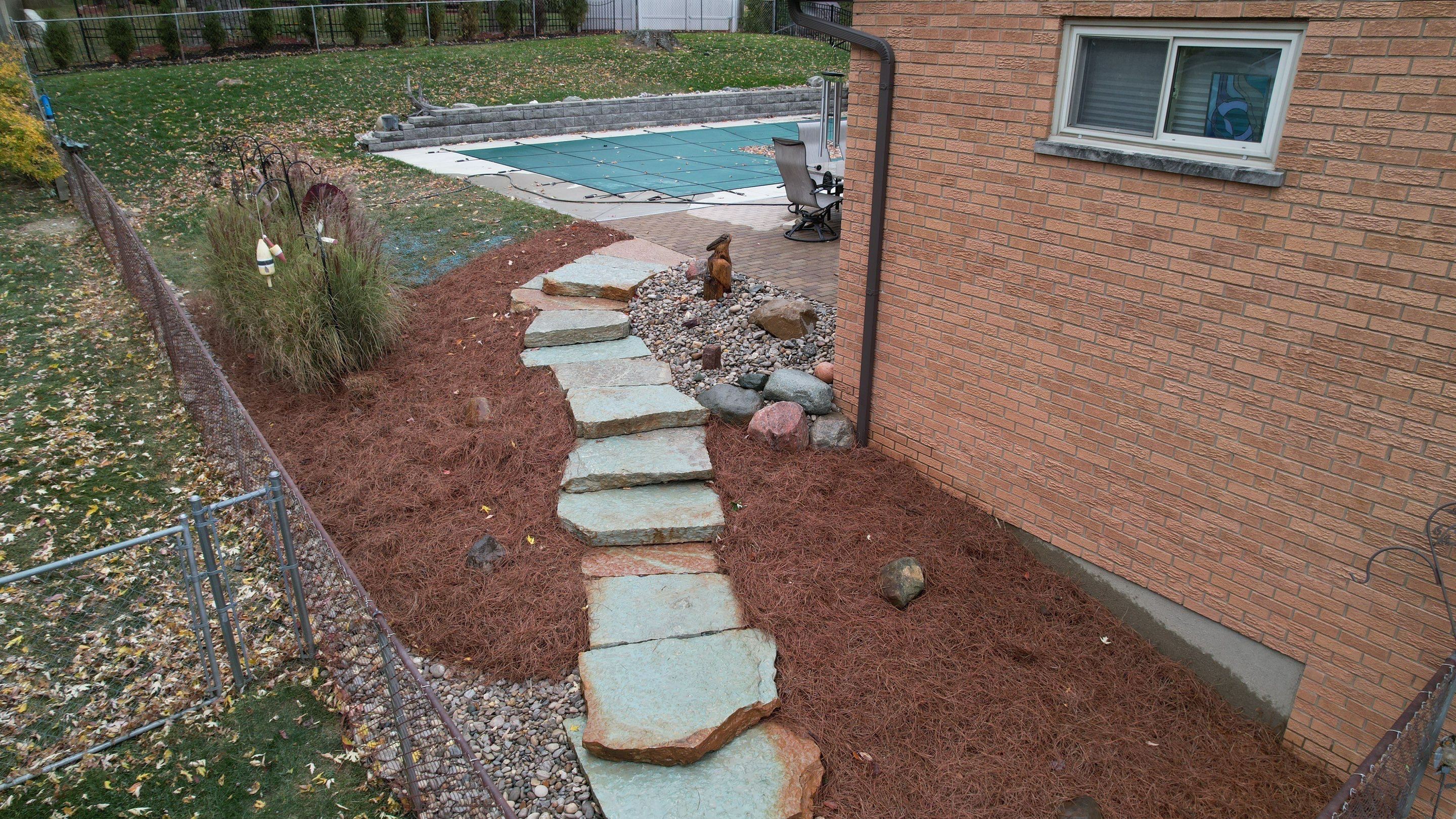 Rustic Buff Tread Stairway Installation by Reisenberg’s Lawn & Landscape, LLC