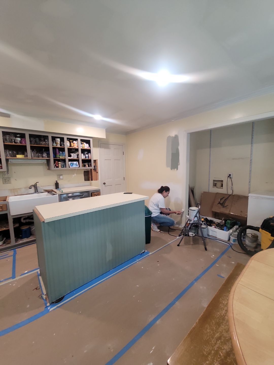 A Pathway to Personality – A Two-Tone Kitchen Transformation in Apex by Elite Remodeling and Design LLC
