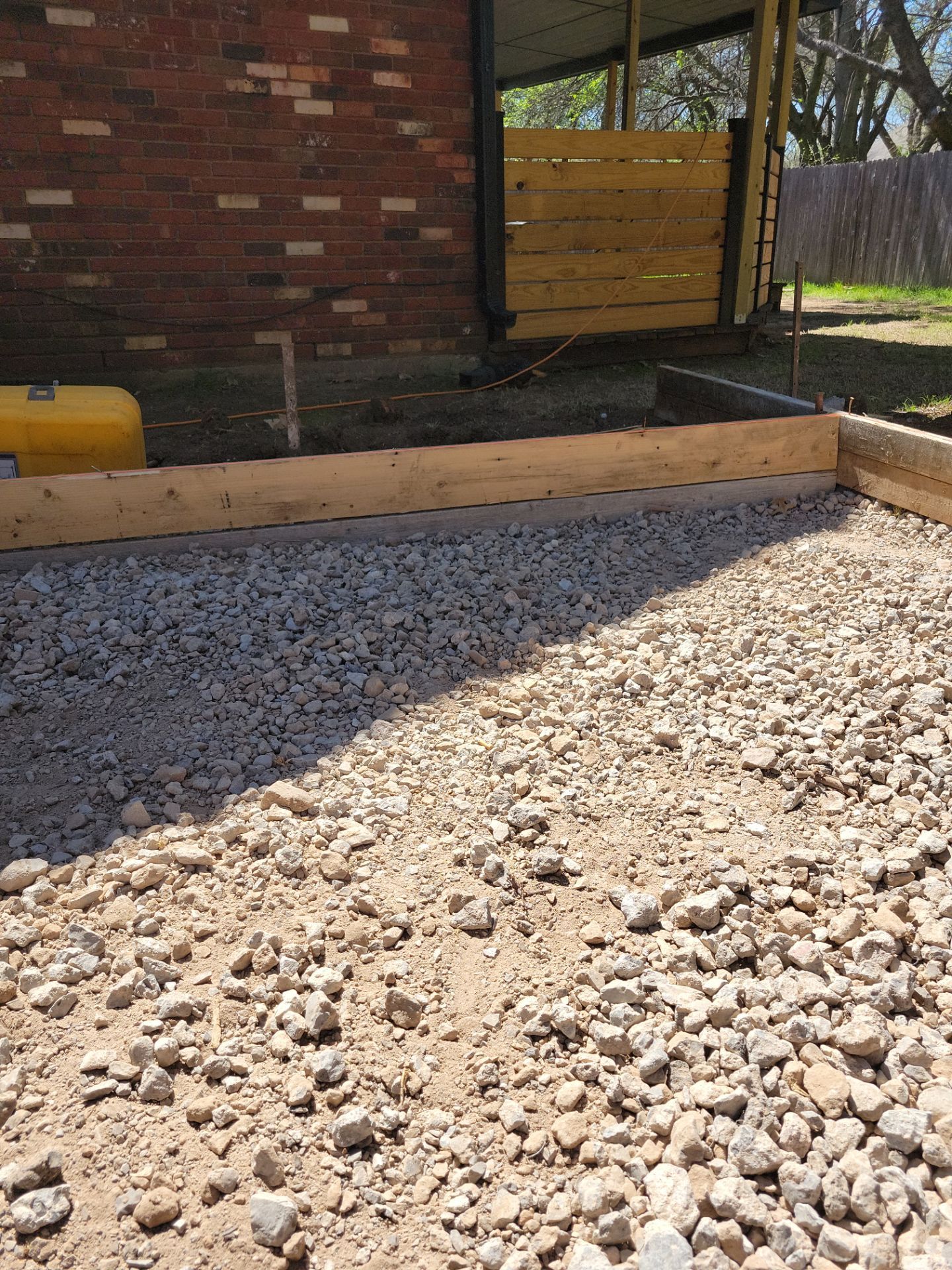 Concrete Driveway and Fence by Clays Services Inc