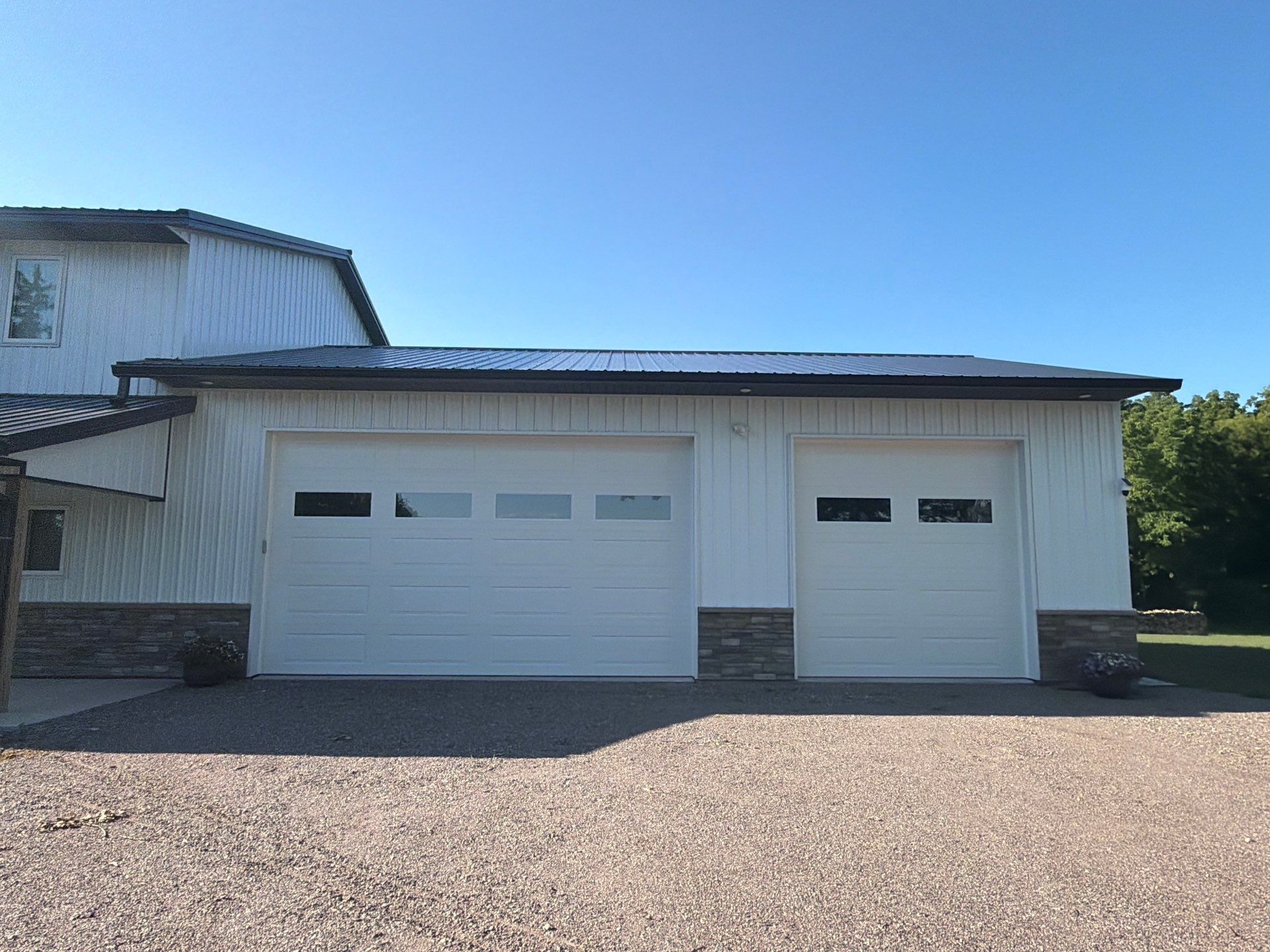 Black Seamless Gutter Installation for barndominium in Buffalo by Next Level Seamless Gutters / Exteriors Inc.