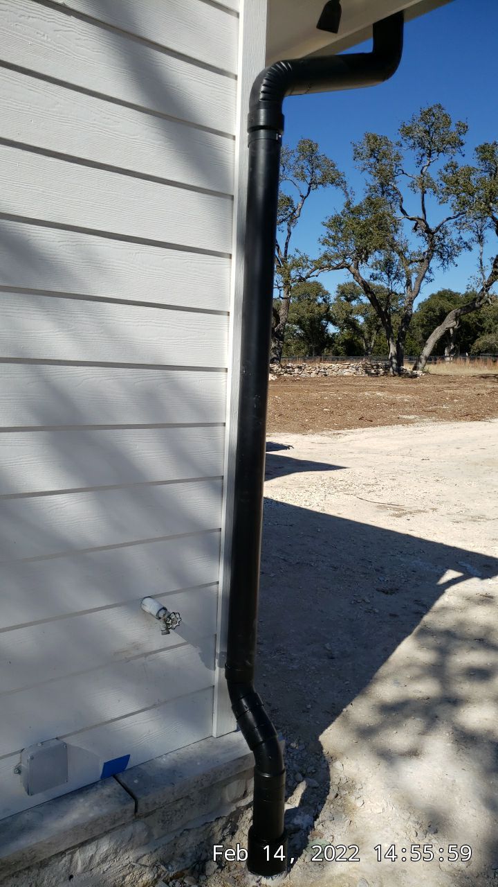 30K gallon mangrove green tank for residential rain water harvesting, Dripping Springs, TX by Hill Country Rain Water
