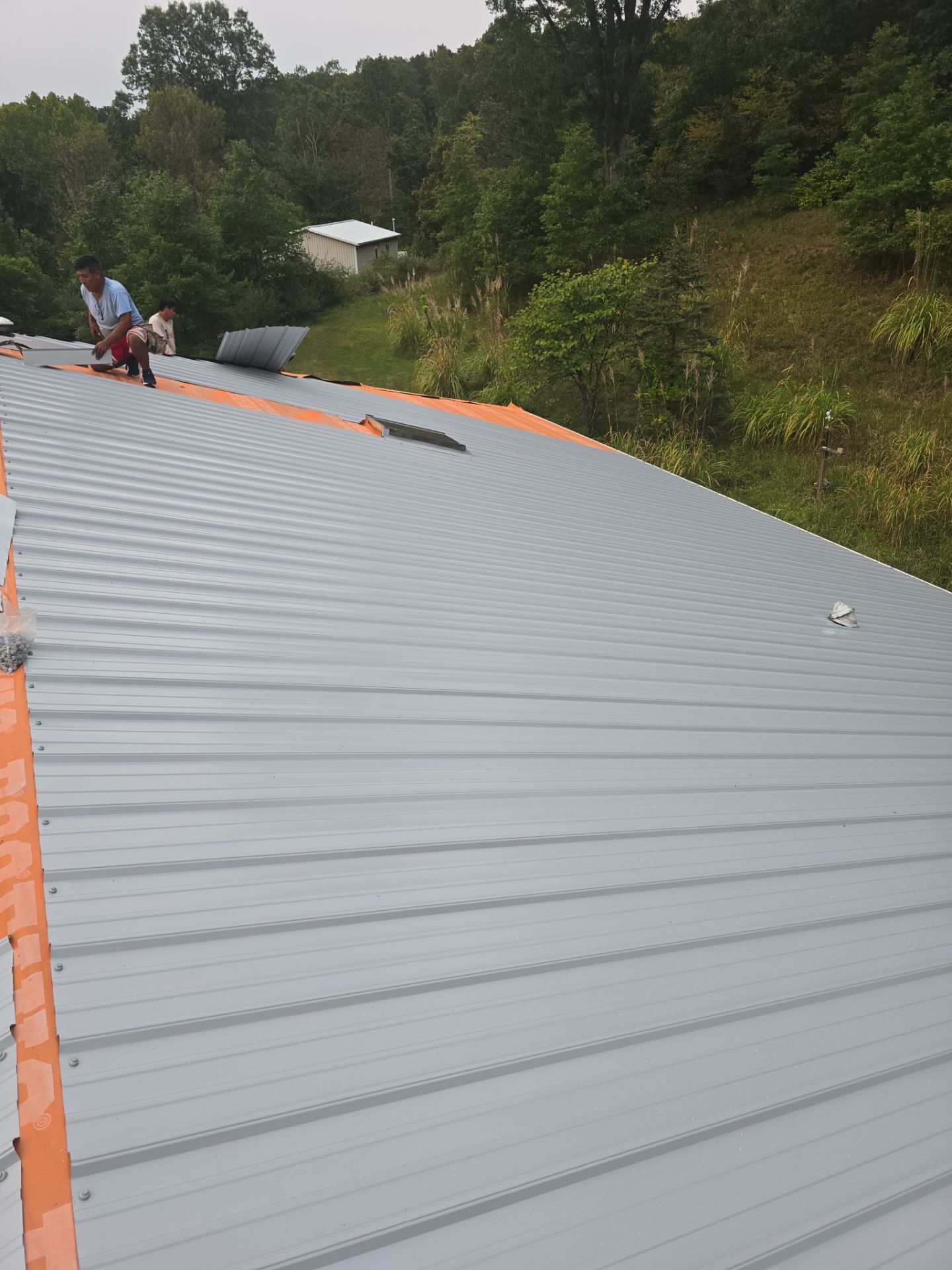 Residential Roofing Installation using Metal by Rainstoppers Roofing