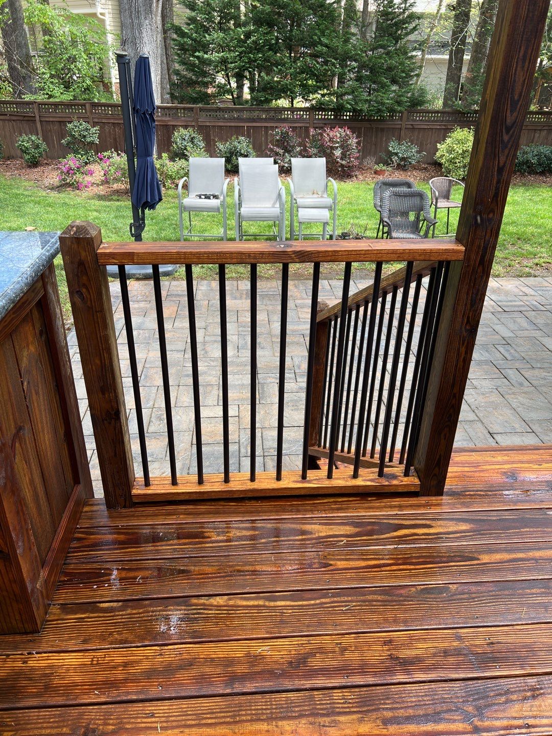 Deck and Stamped Concrete Patio by DuraSeal