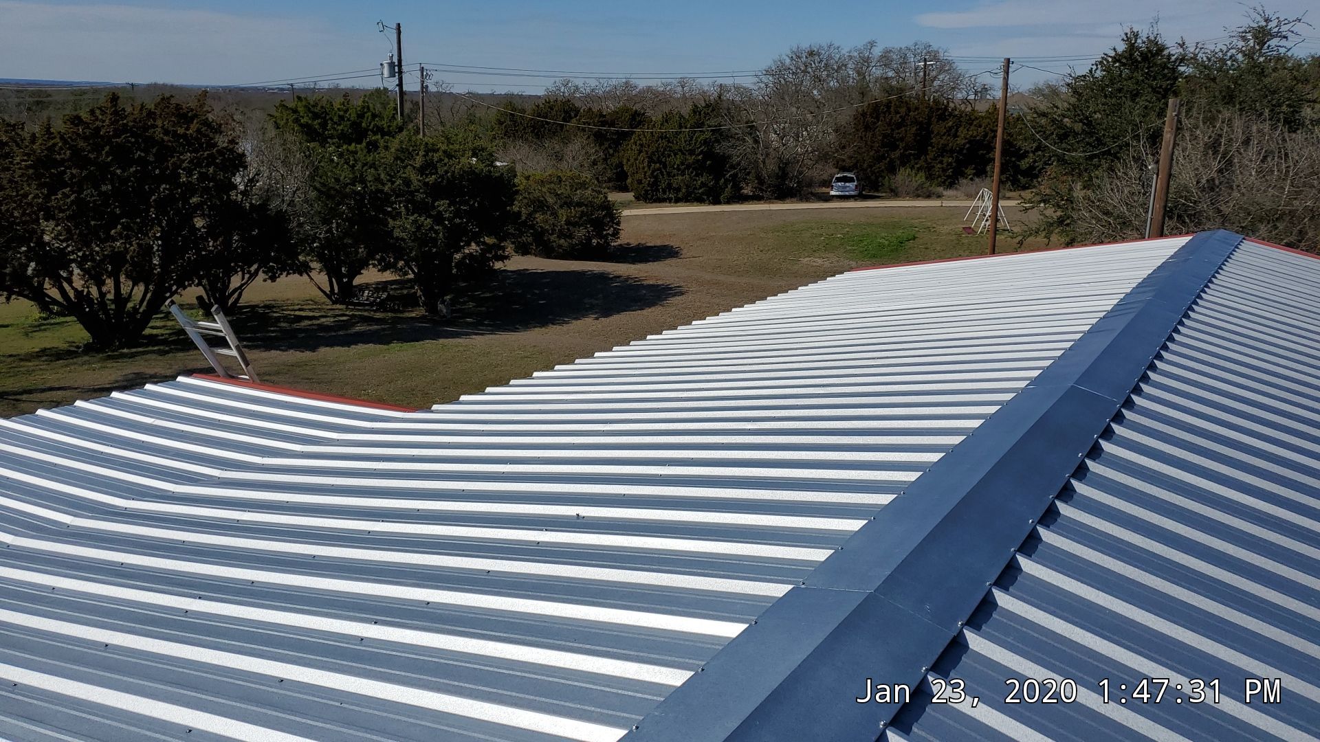 Residential Roofing Installation using PBR Metal Roof by Harvey Roofing & Construction