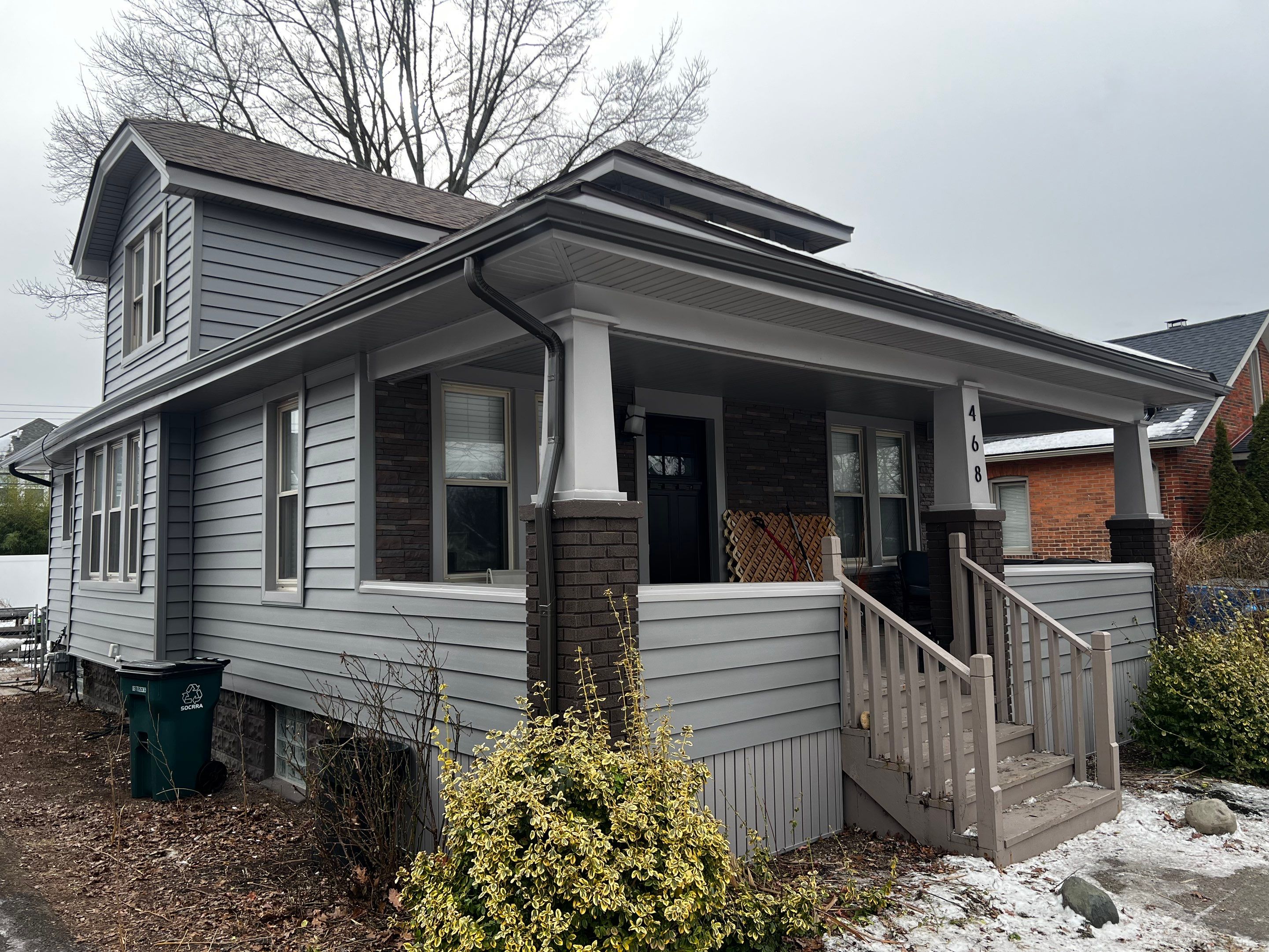 Vinyl Siding Replacement by Bloomfield Construction & Restoration