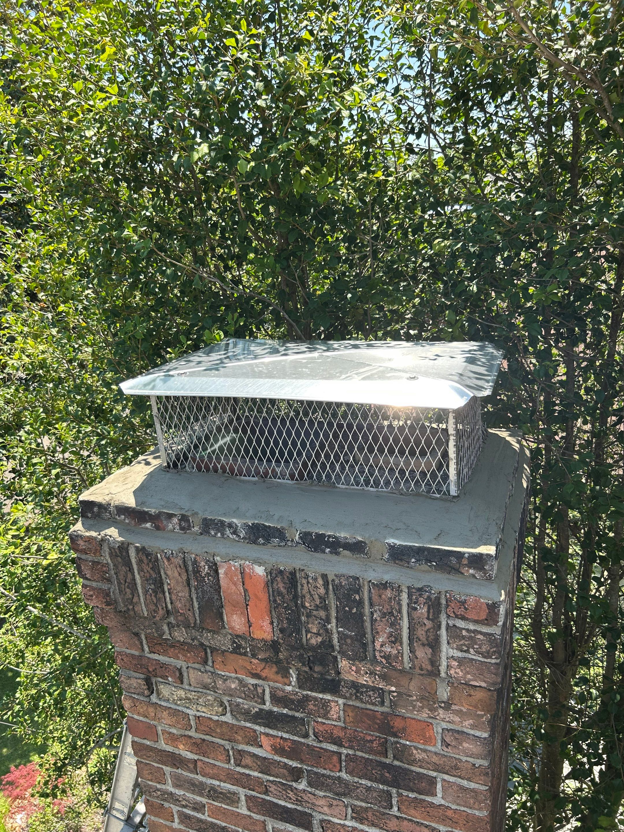 Flashing and Multi-Flue Cap in Norfolk by Premier Chimney and Roofing