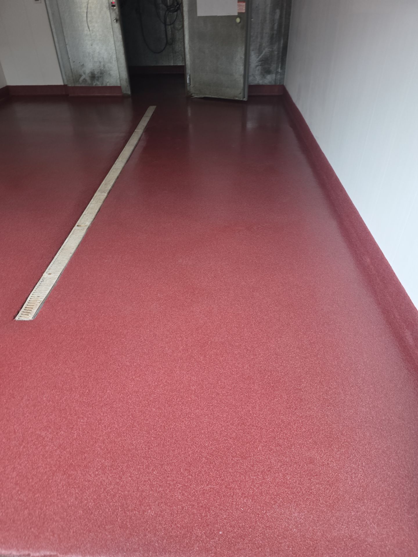 Industrial Red Quartz Polyurea Floor Installation for Atascadero Brewery by MGP Coatings