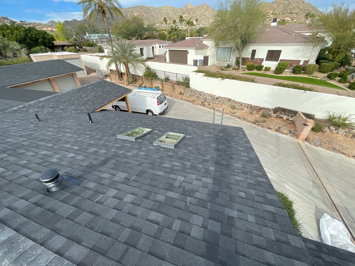 Onyx Black Shingles by Reimagine Roofing