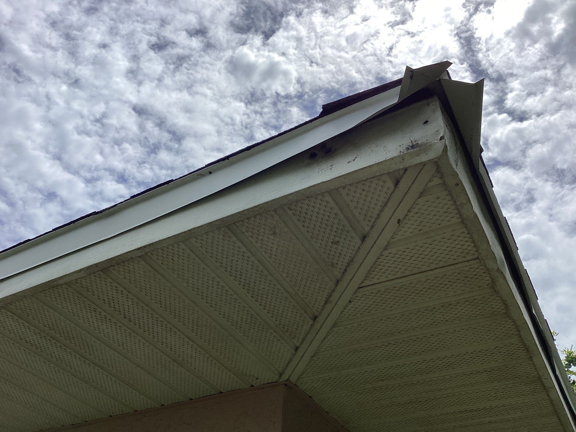 Replace gutter using White Down Spouts in Cape Coral FL by Gutter Professors
