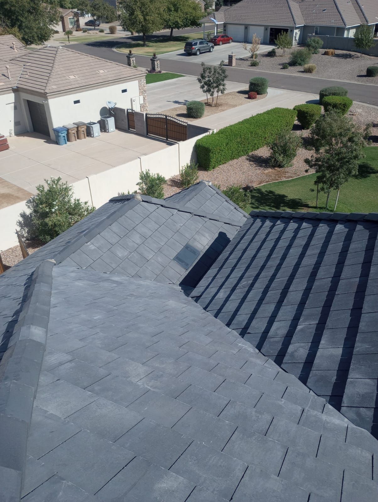 Gray Tile by Reimagine Roofing