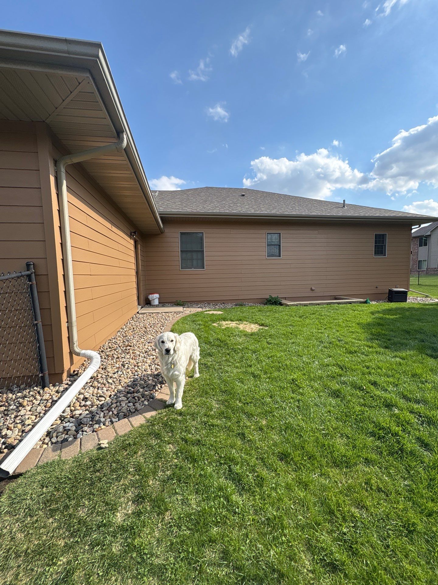 Sioux Falls Residential Exterior Door and Siding Refresh by Select Painting, Coatings & Garage Cabinets