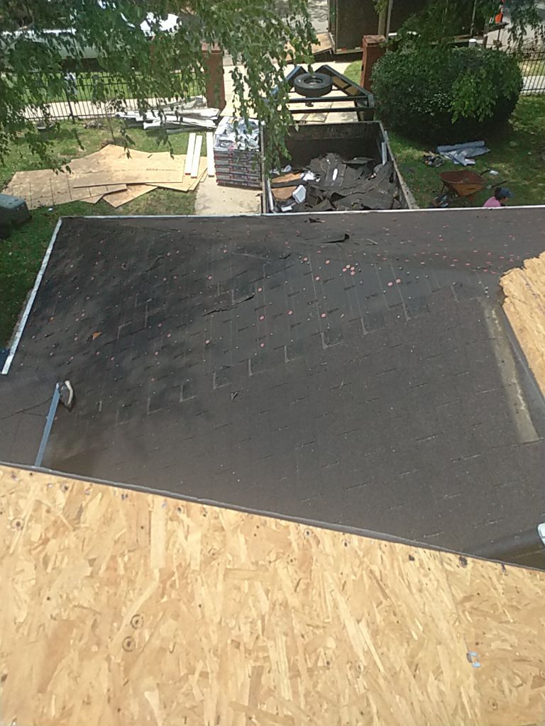 Residential Roofing Installation using Roof Replacement by American Roofing & Construction LLC