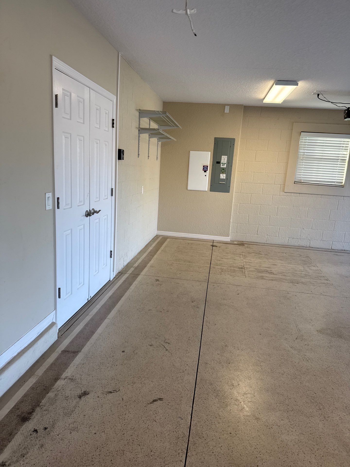 Garage in Domino by Innovative Concrete Coatings 