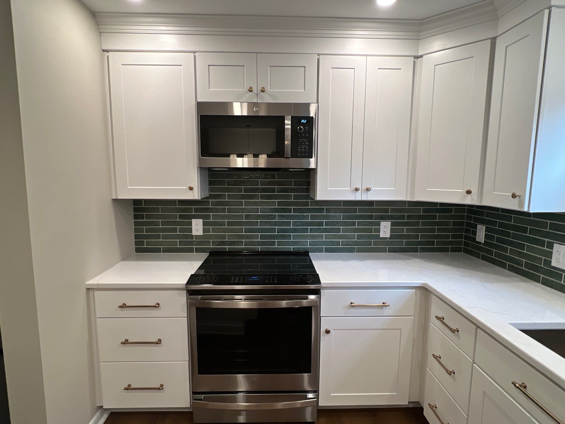 Phoenixville Kitchen Remodel with White Shaker Cabinets and Green Backsplash by Reliable General Contracting