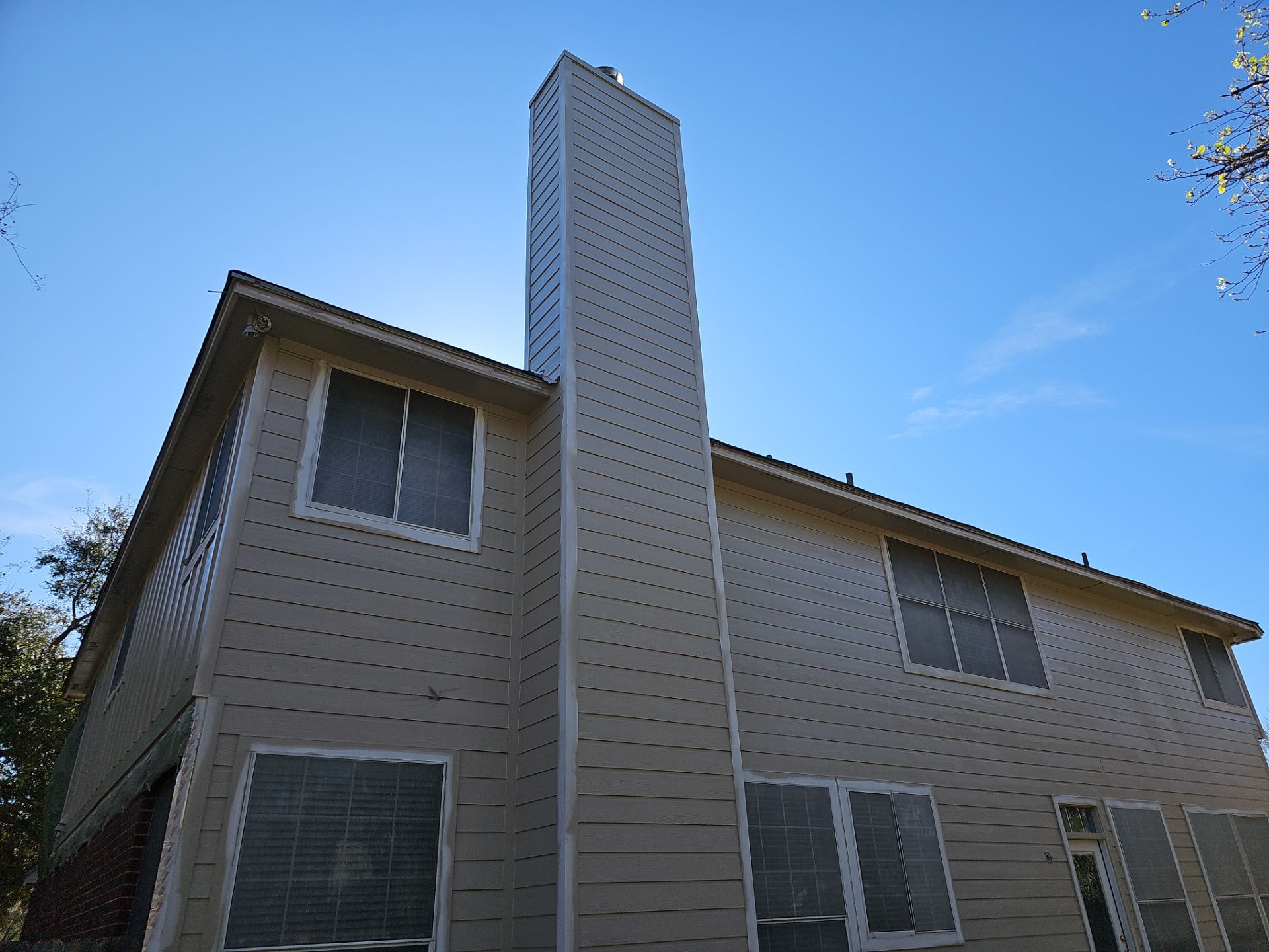 New Hardie Lap Siding & Board and Batten by DeZign Roofing & Exteriors
