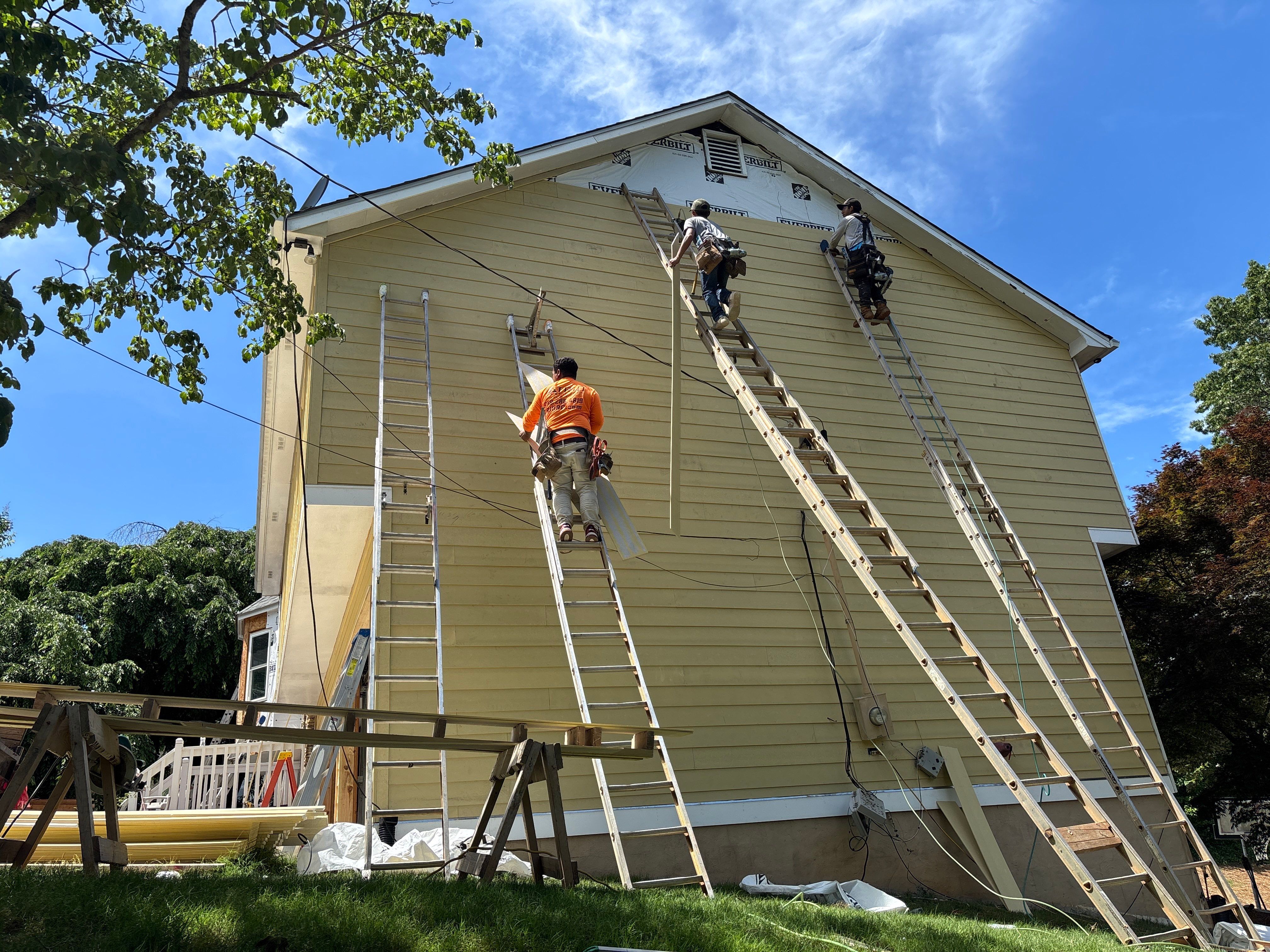 Siding replacement  by Deerfield Roofing LLC