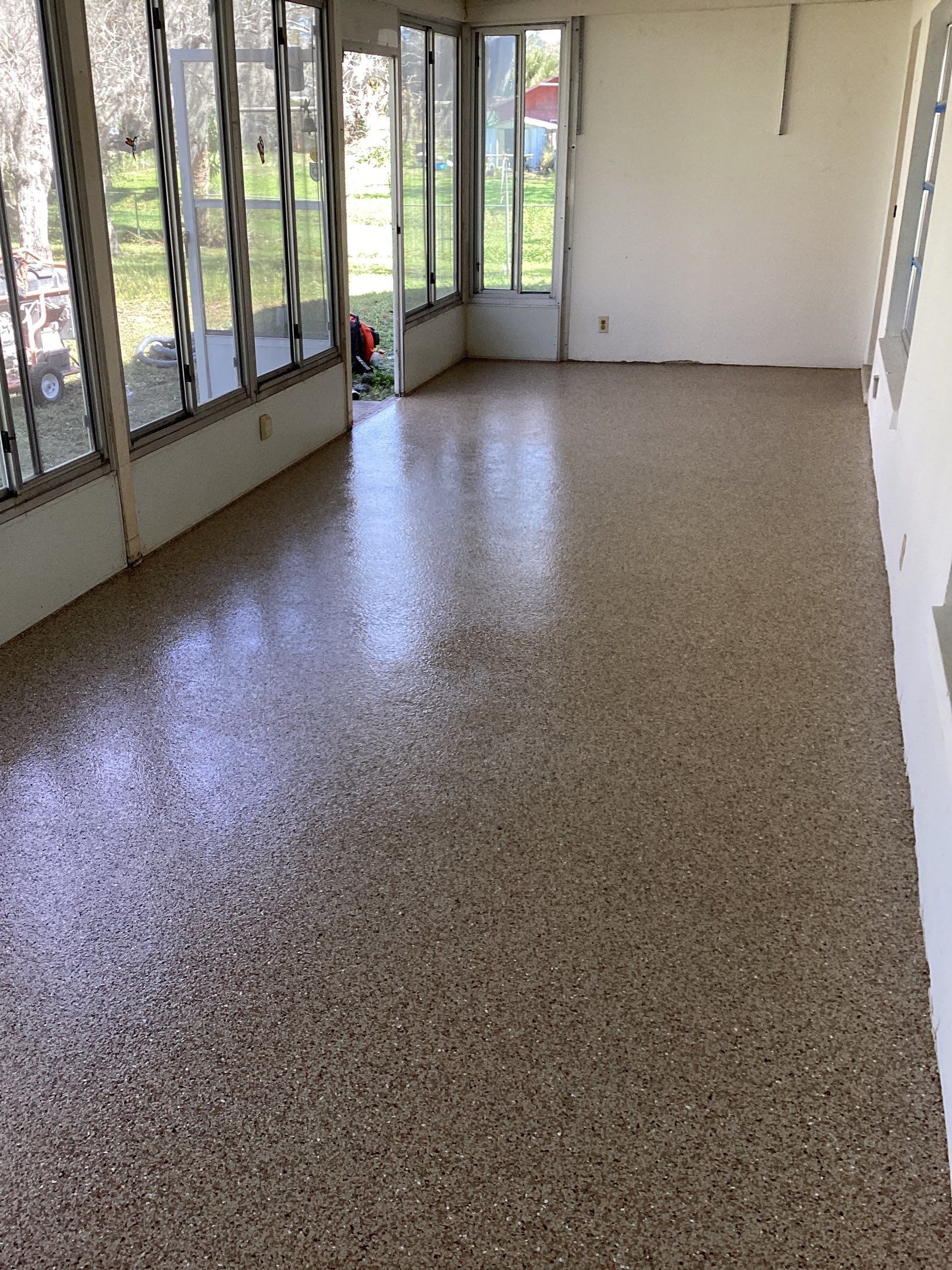 Patio using Pebble Beach by Amvet concrete coatings llc