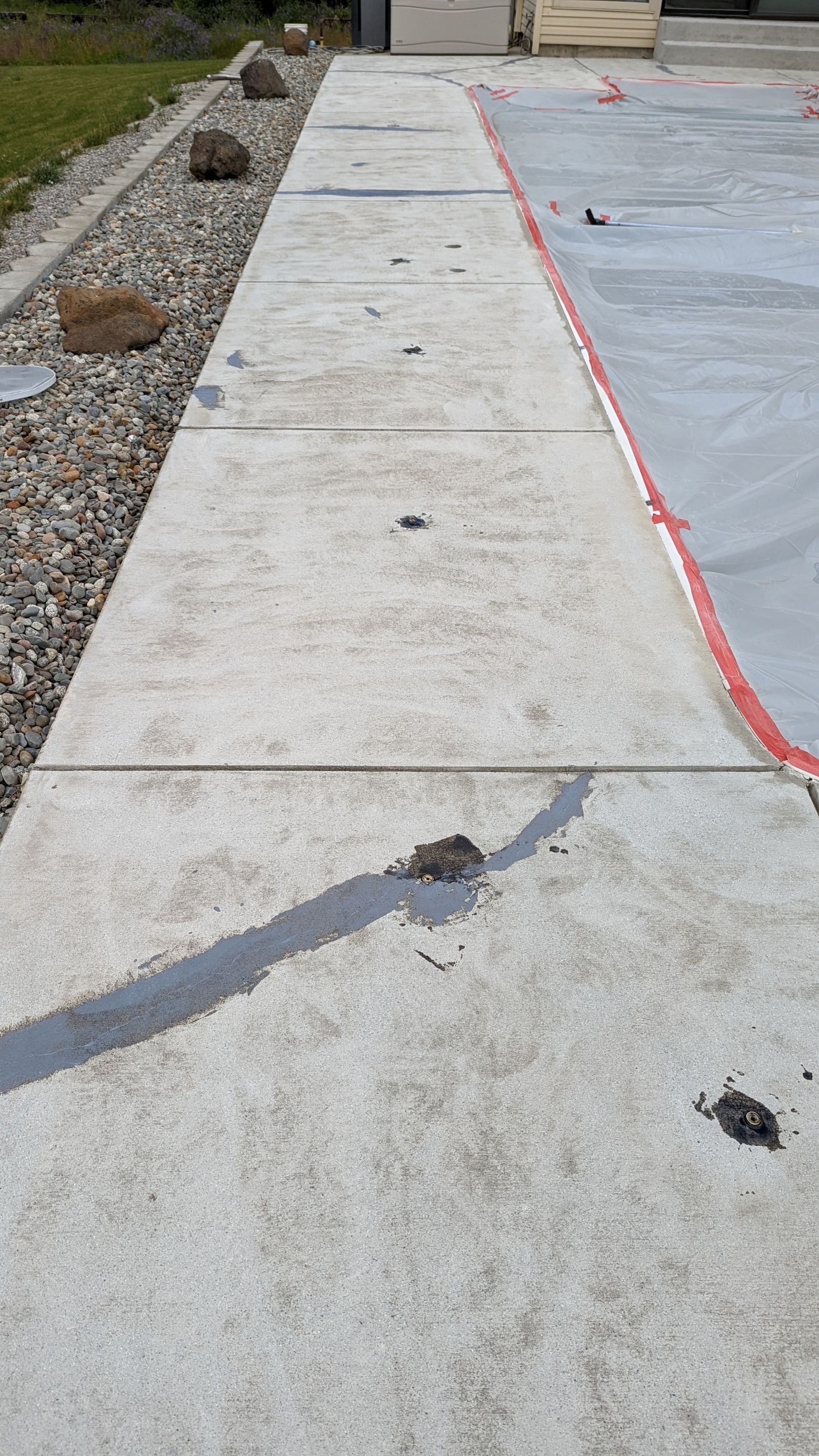 Garage Transformation using Domino for Garage and Pecan for Pool Deck by Croc Coatings, LLC