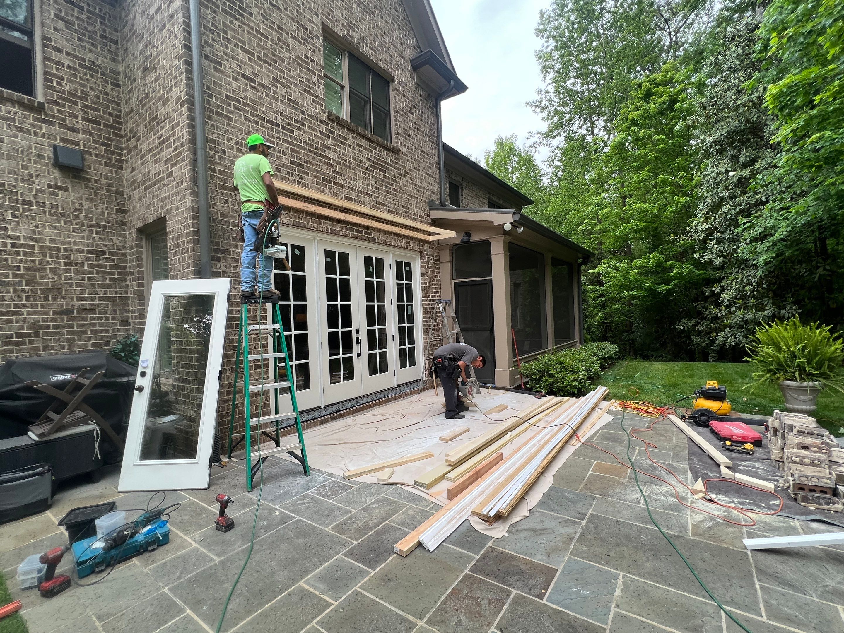 Atlanta French Door Installation with Custom Wood Overhang and Flagstone Patio by Swift Home Renovations