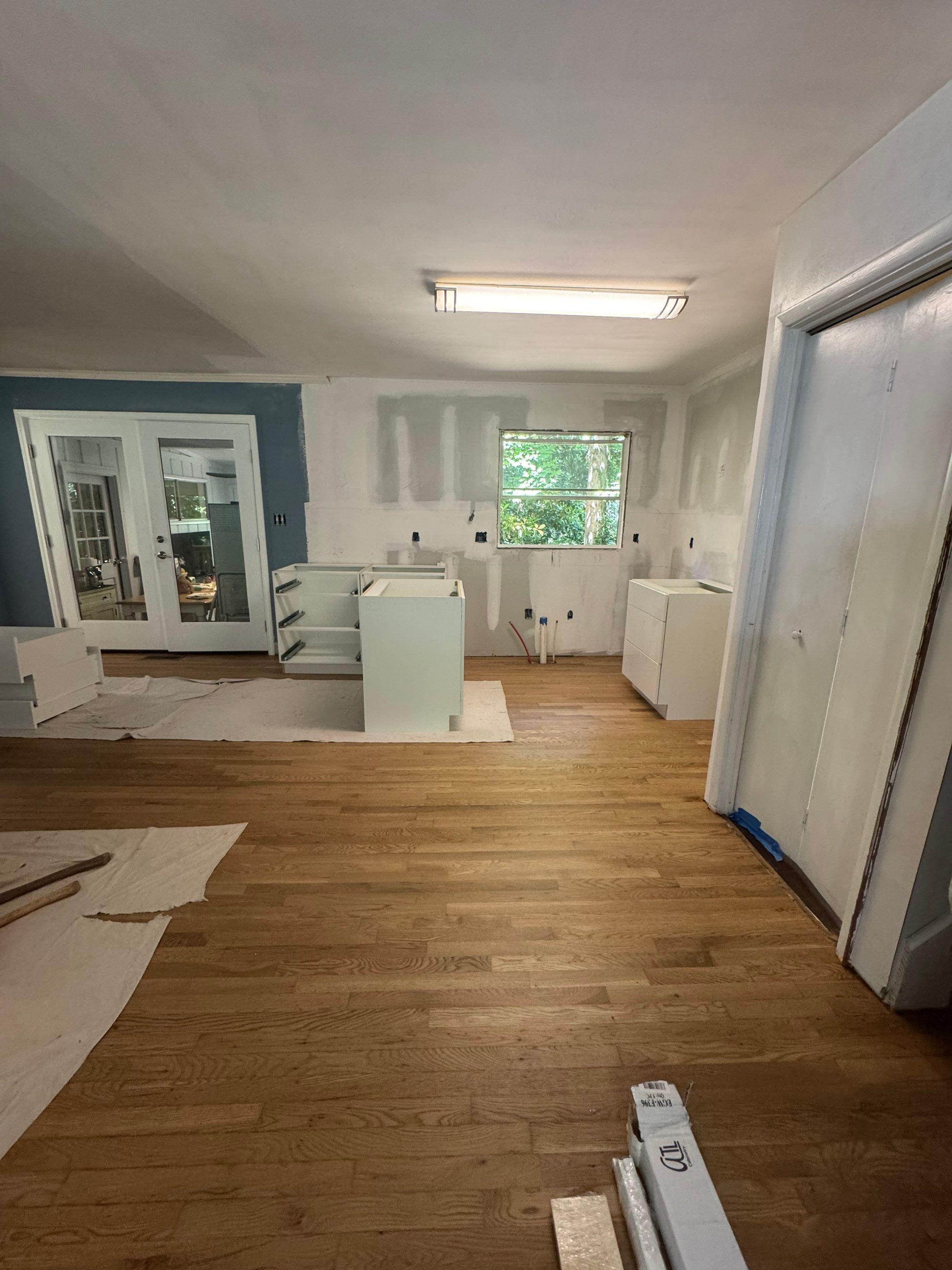 Modern Kitchen Remodeling with Large Central Island in Doraville by Swift Home Renovations