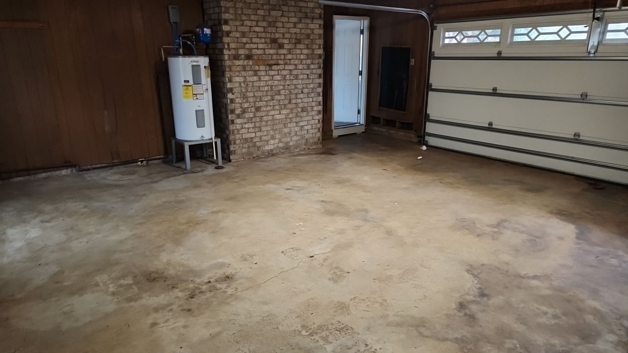 garage floor clean using cleaner by G&H Home Tech Pros LLC