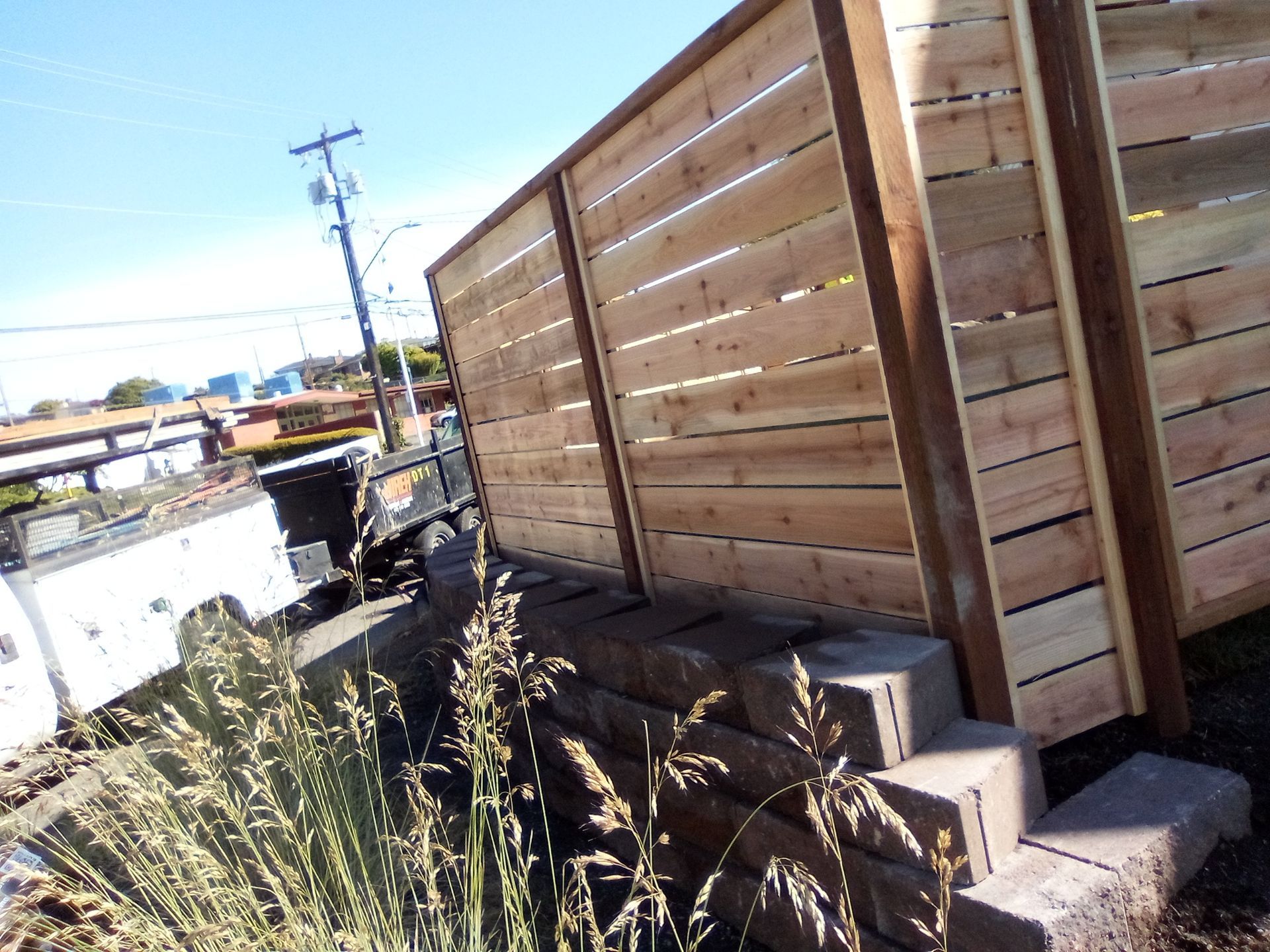 Retaining Wall & Fence Installation  by Jireh Asphalt & Concrete Inc 