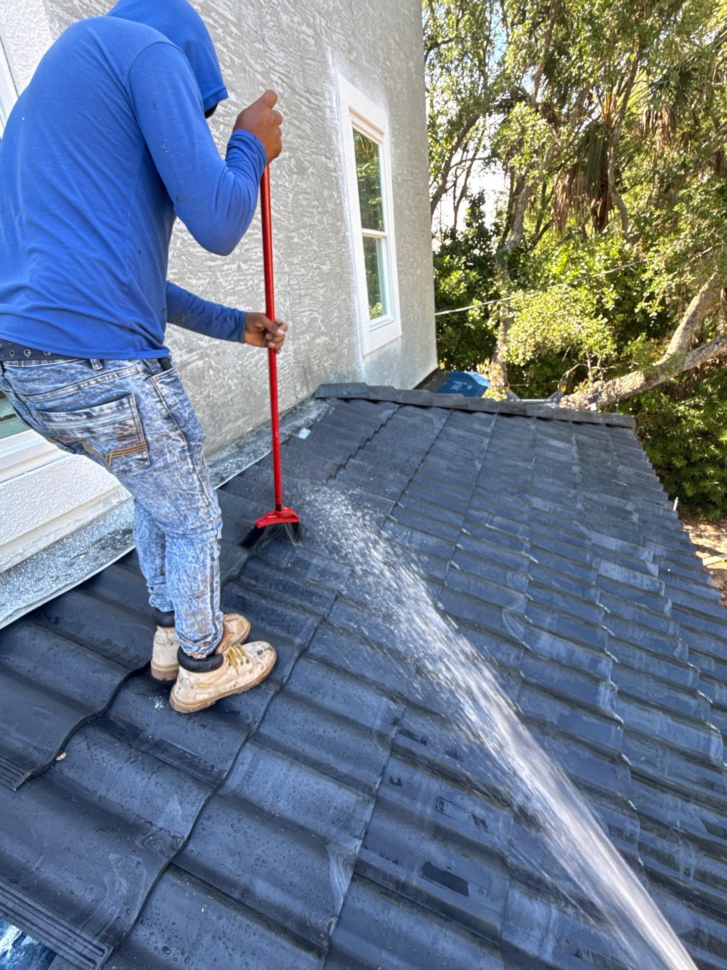Flagler Beach Residential Tile Roof Replacement with Dark Barrel Tiles by Fortified Roofing Solutions Corp.
