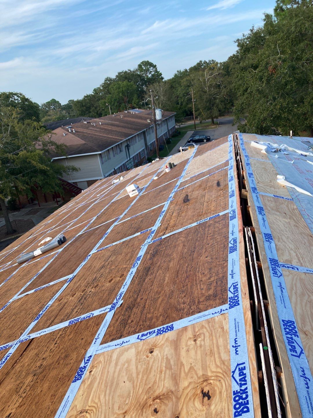 Residential Roofing Installation using Roof Replacement by American Roofing & Construction LLC