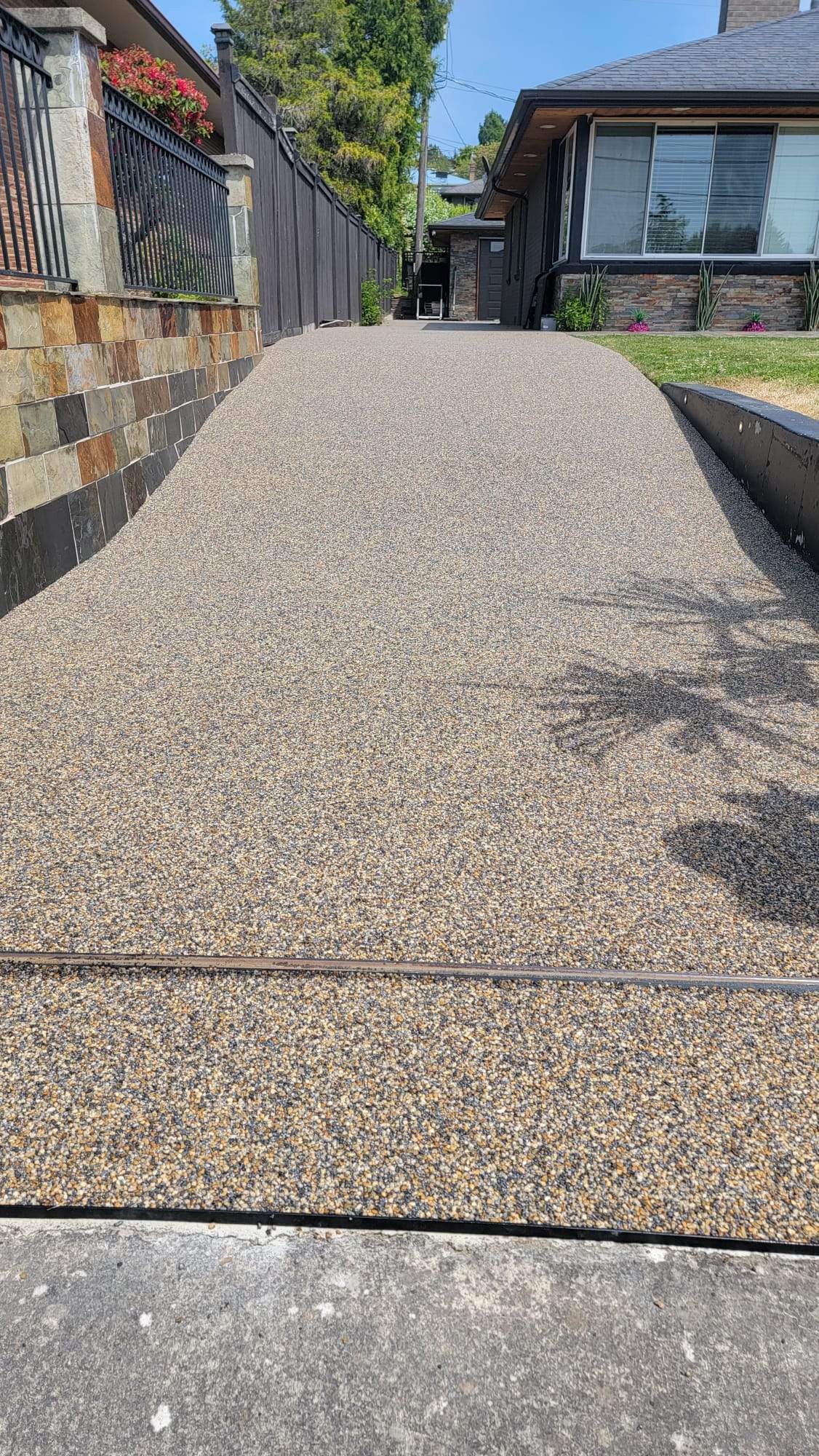 The Versailles Vuba Elegance Driveway by Concrete Coating Experts Inc.