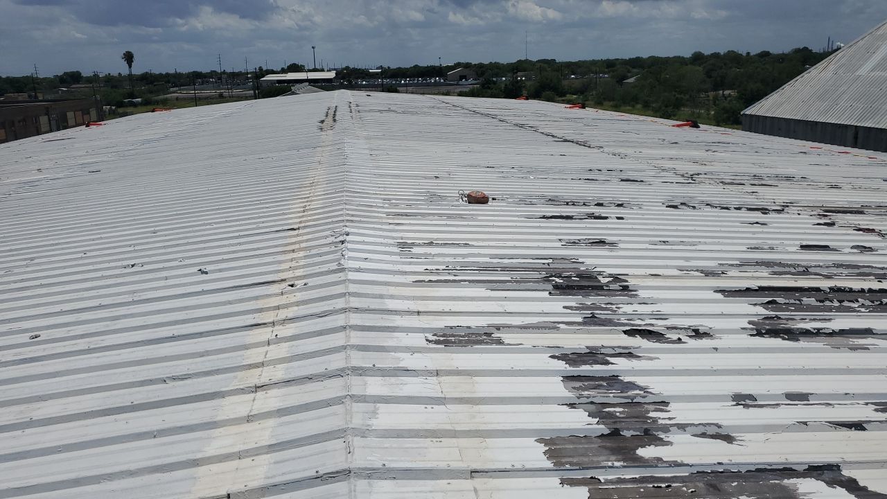 Commercial Roofing Installation using GAF 10 Year Acrylic System by Lighthouse Roofing
