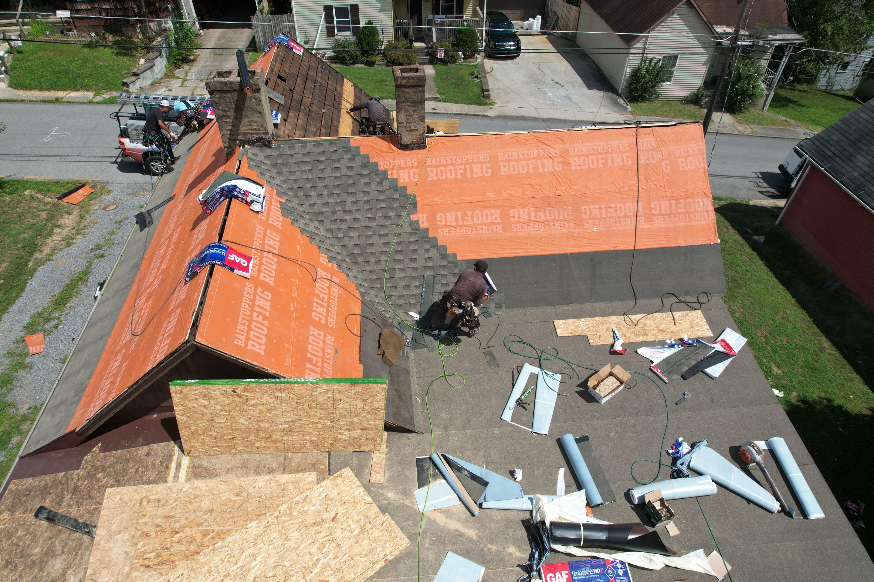 Residential Roofing Installation using GAF Timberline HDZ Weathered Wood by Rainstoppers Roofing