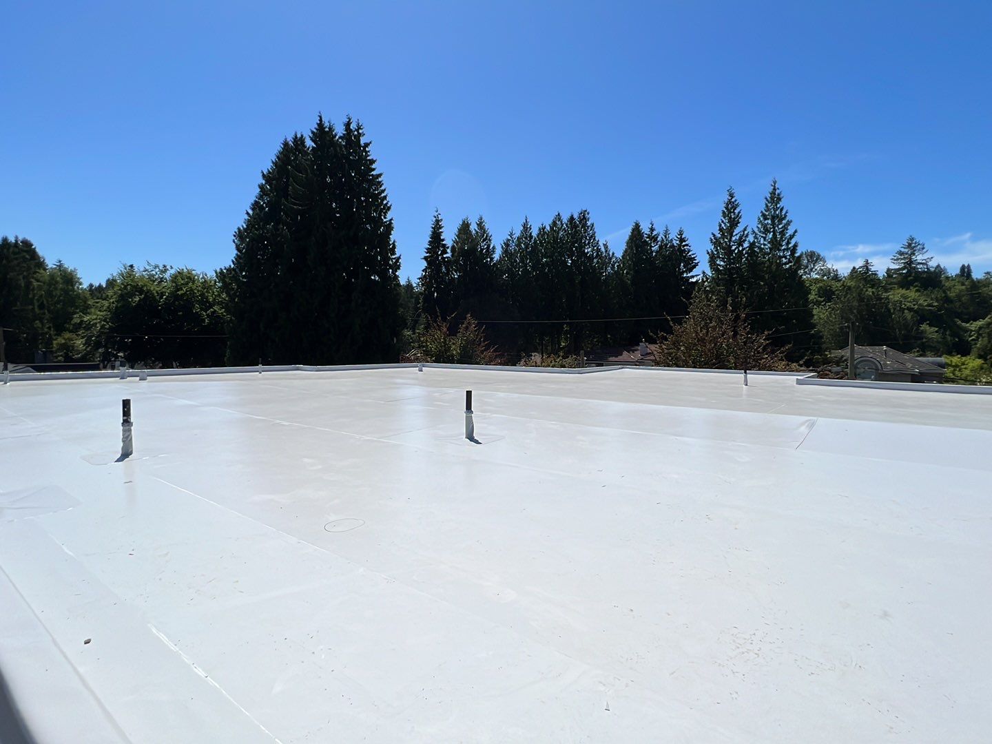 Residential Roofing Installation using Durolast roofing membrane by Top Notch Roofing Inc