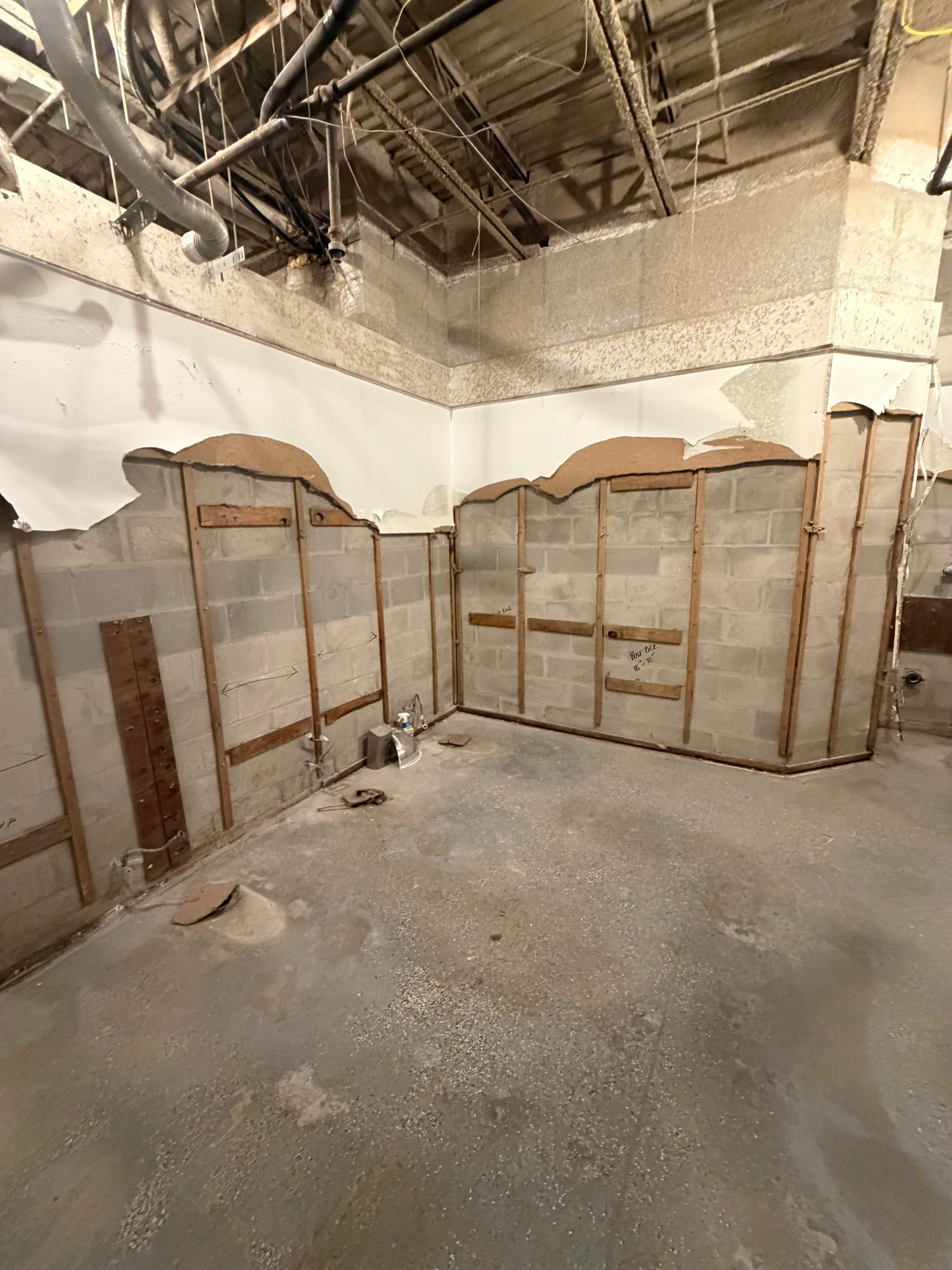 Commercial Restroom Renovation with Epoxy Flooring in Sarasota by Vertical General Contracting 