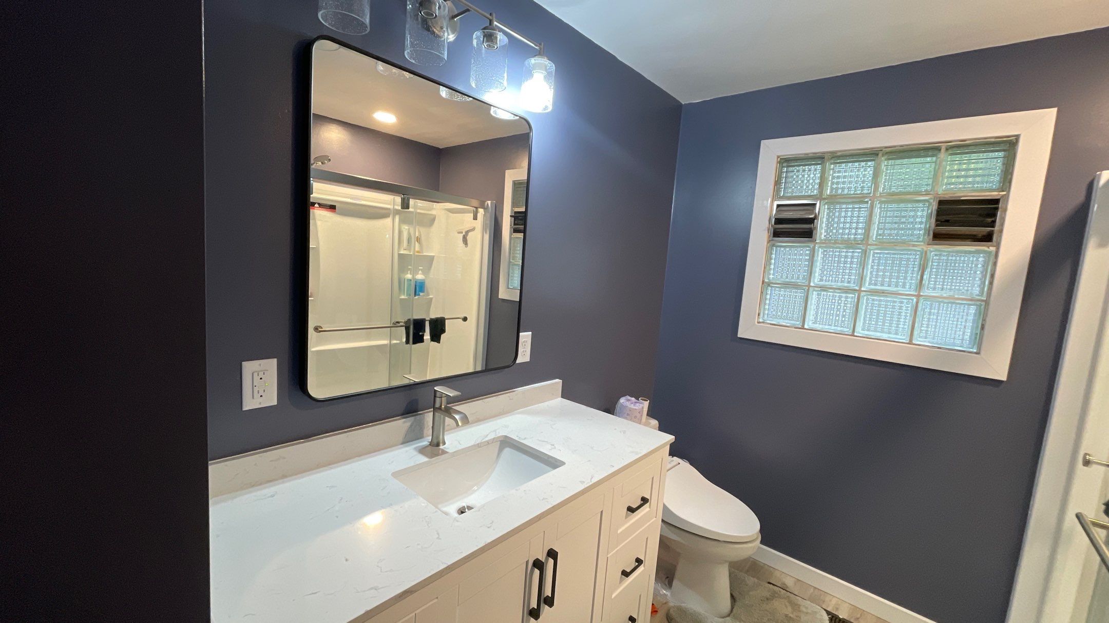 Bathroom Remodel using Shower Kit by Villegas Remodeling, LLC