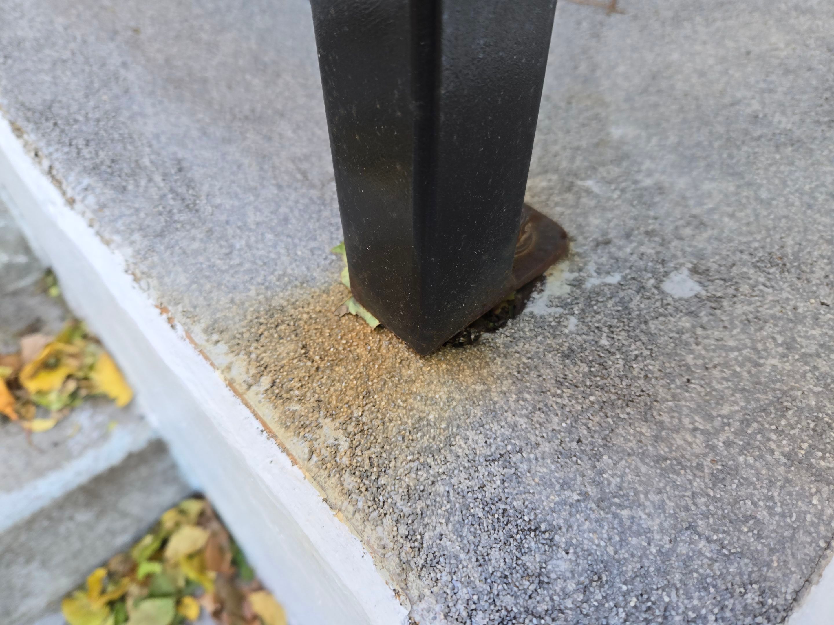 Grey Polyaspartic Porch and Stair Resurfacing in Sioux Falls by Select Painting, Coatings & Garage Cabinets