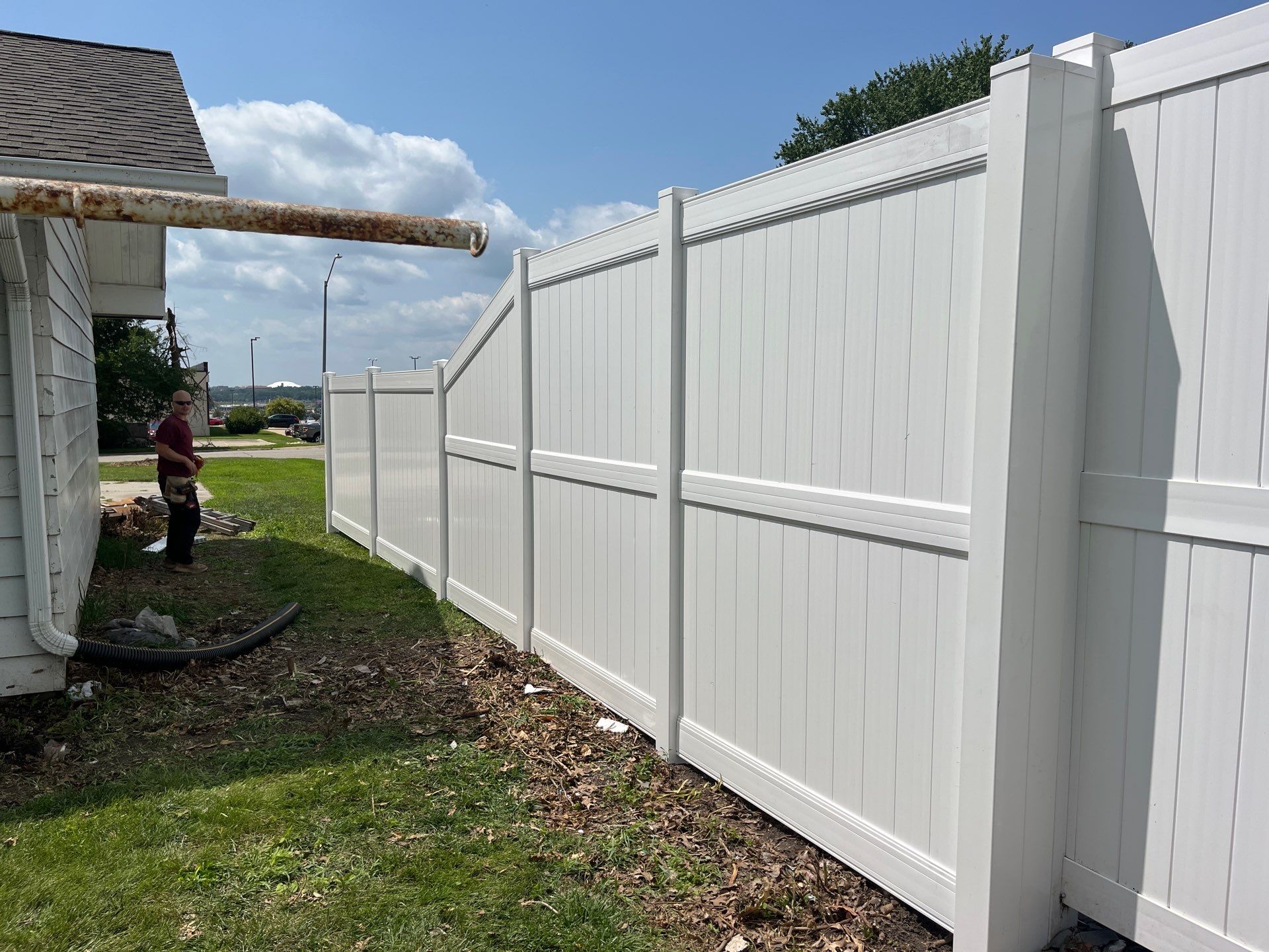White Vinyl Privacy Fence Installation in Cedar Falls by Perfect Picket Fence and Stain