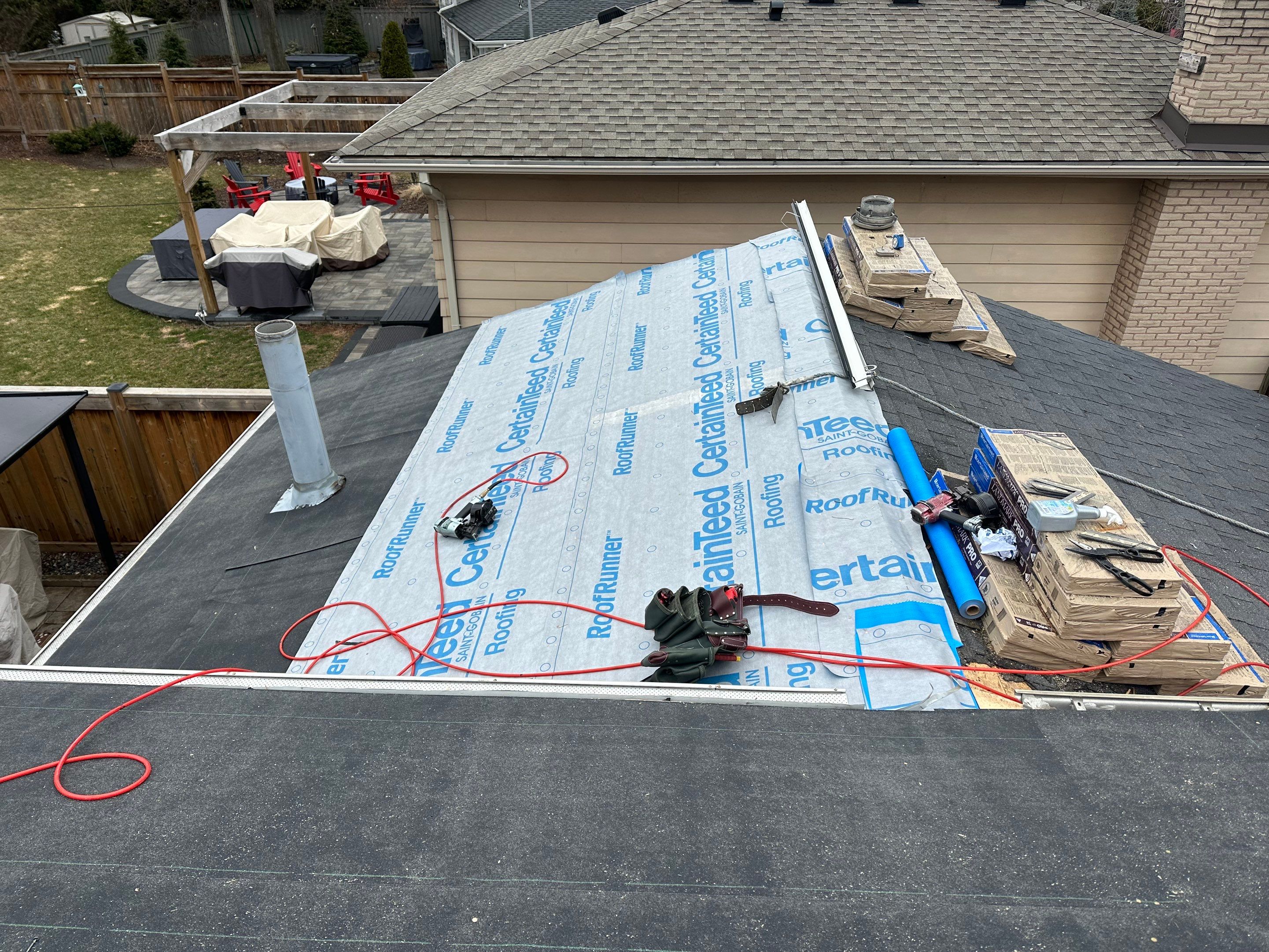 Project in Burlington by The Roofing Crew