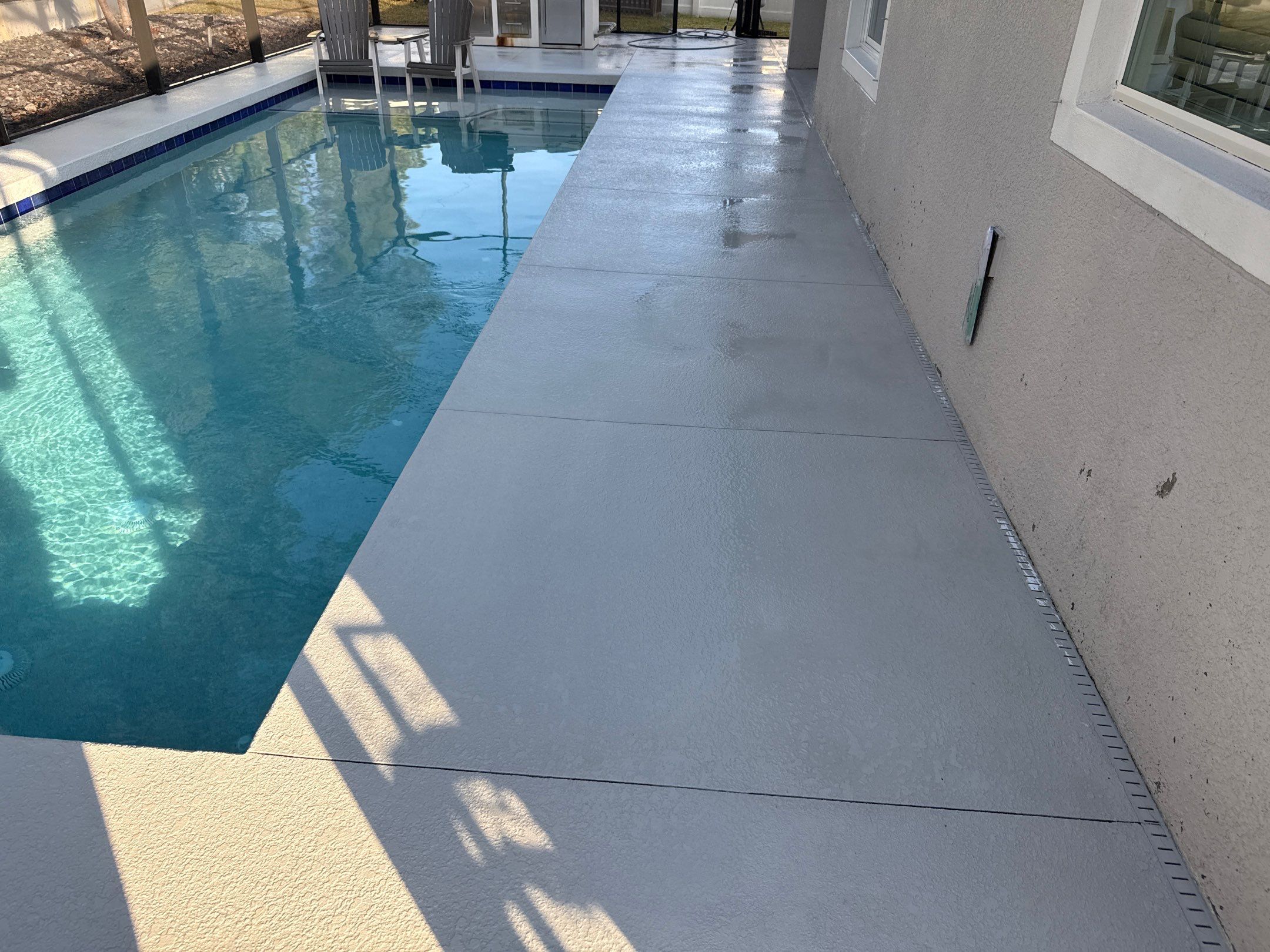 Painted Pool Deck & Screen Enclosure Cleaning | Heron Creek, Palmetto FL by Sunshine AquaWash