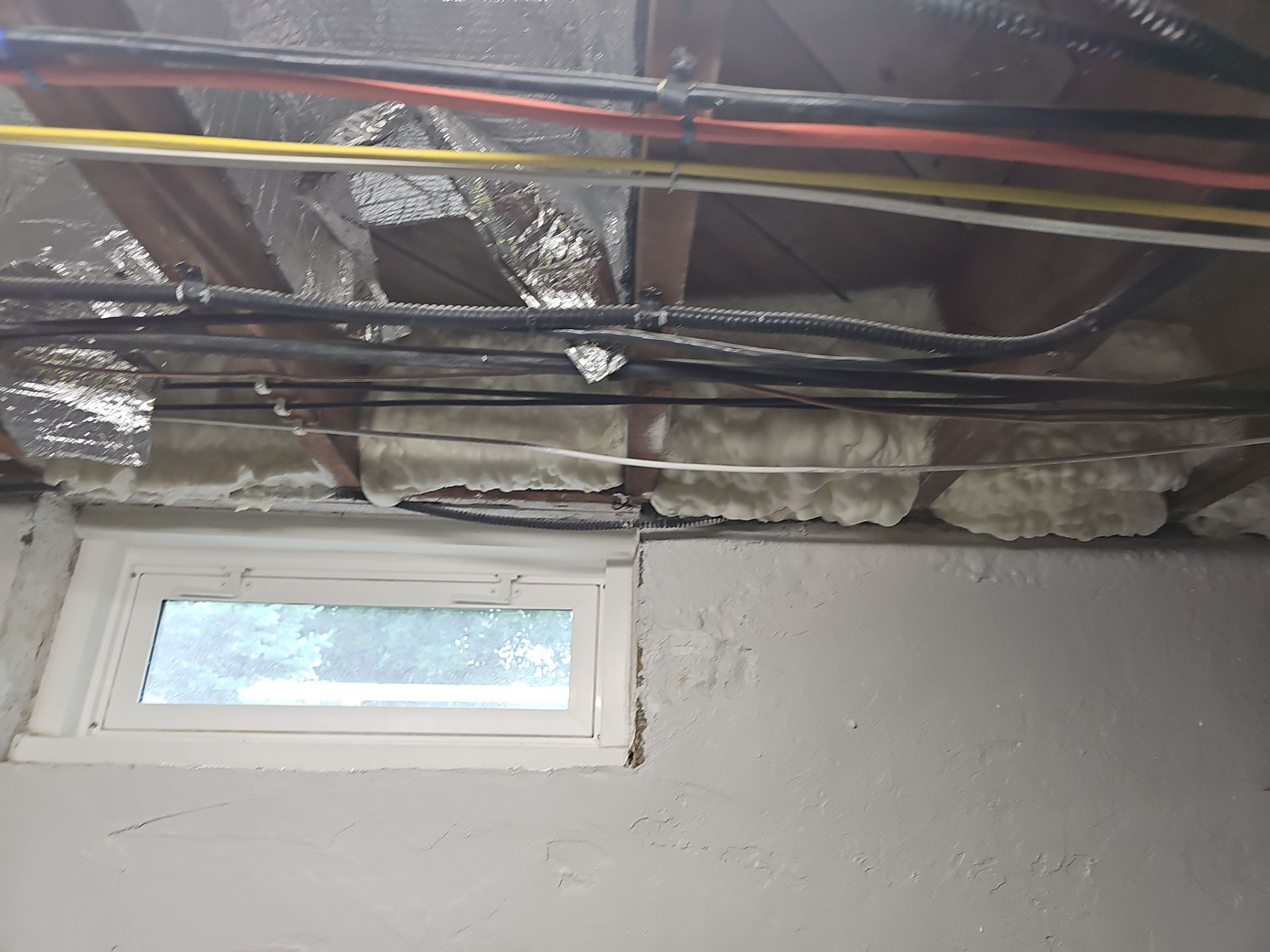 Attic Insulation using open cell spray foam by NYS Foam & Energy