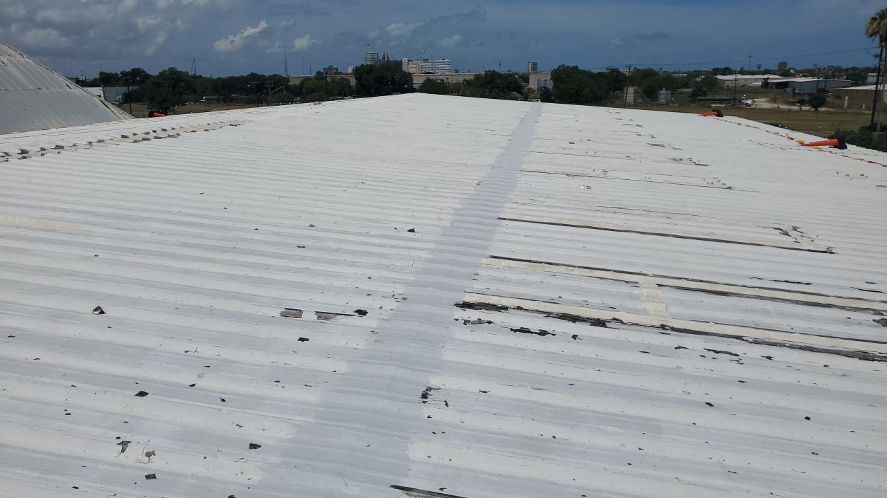 Commercial Roofing Installation using GAF 10 Year Acrylic System by Lighthouse Roofing