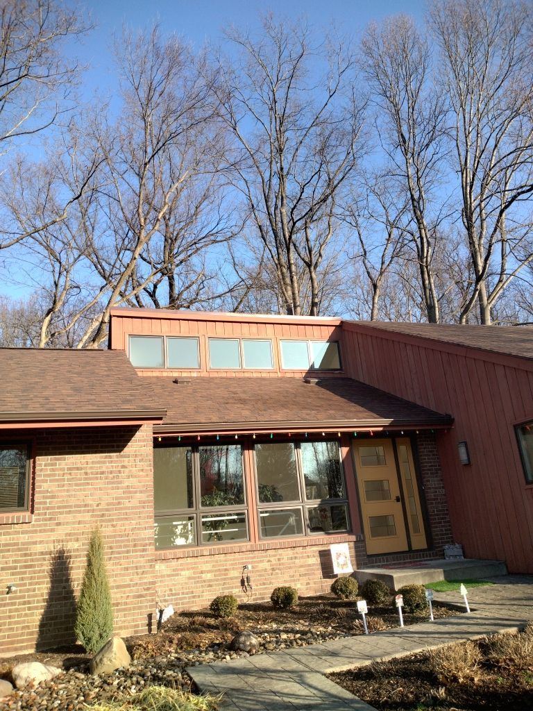 Residential Roof Replacement by Absolute Roofing and Construction