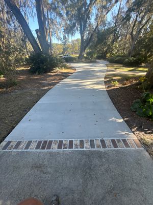 Custom Concrete Driveway Installation with Decorative Brick Borders in Okatie