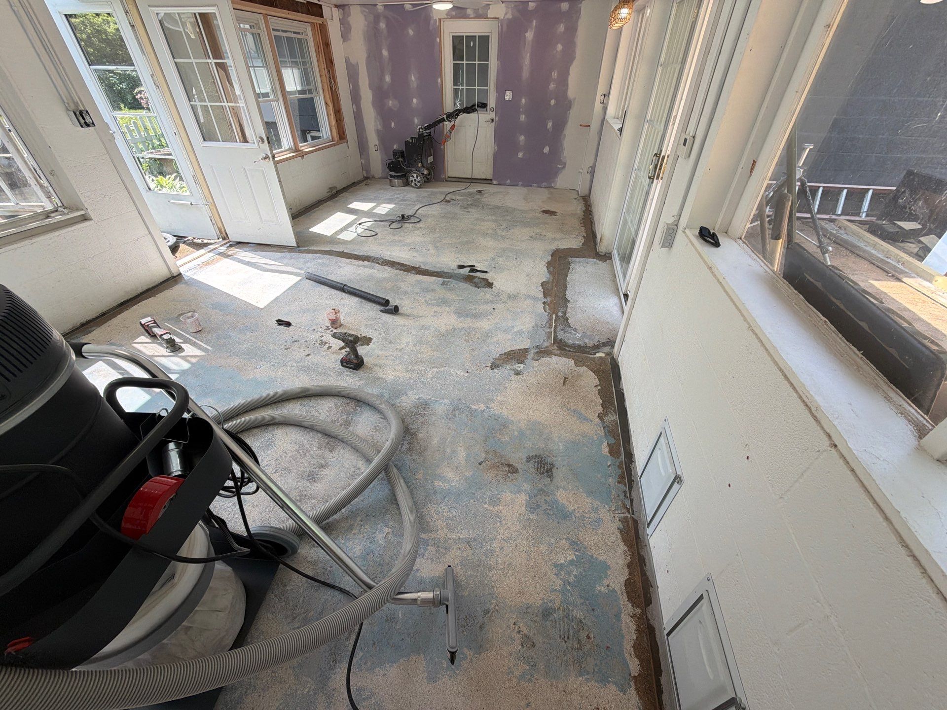 Grey Epoxy Flake Floor Installation for a Muskegon Sunroom by Gordon Painting