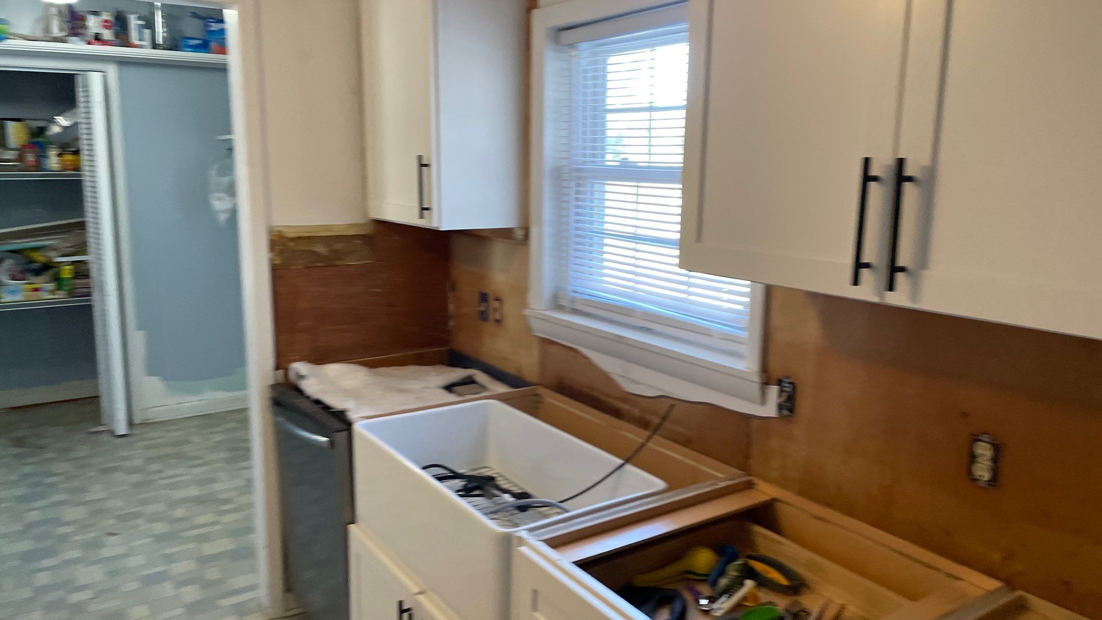 Kitchen Backsplash and Herringbone Tile Floor Remodel by Footprints Floors of Coastal Carolina