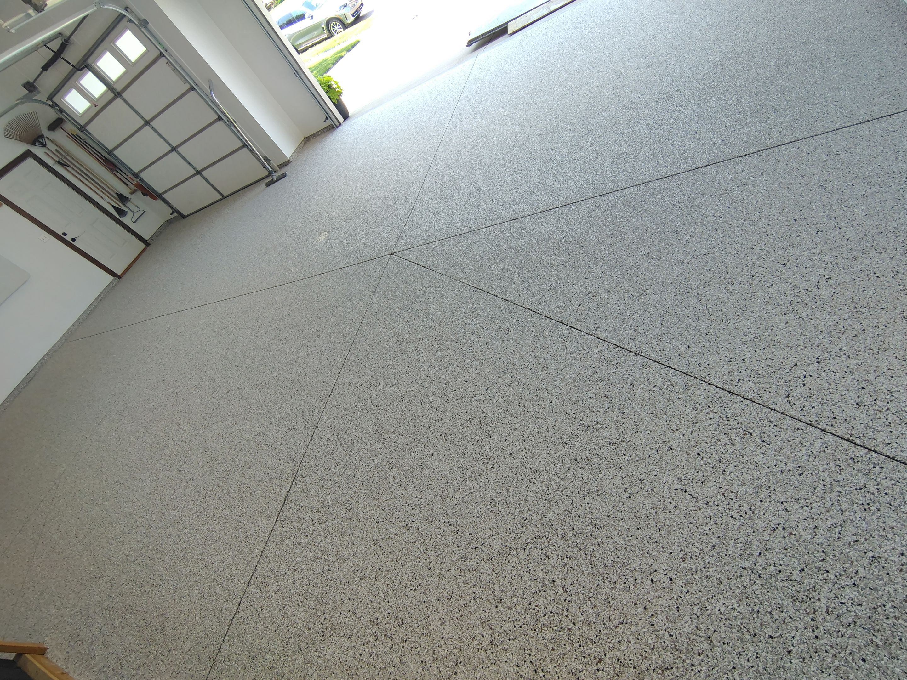 Coyote Garage Floor Coating in Sioux Falls by Select Painting, Coatings & Garage Cabinets