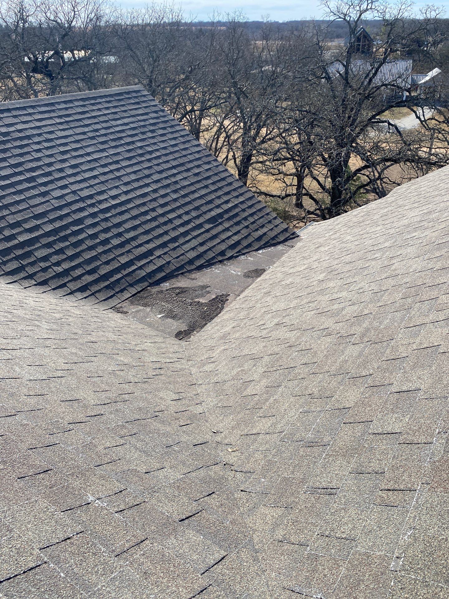 Roof Replacement on a private lake near Ardmore by BANA Roofing and Solar Supply