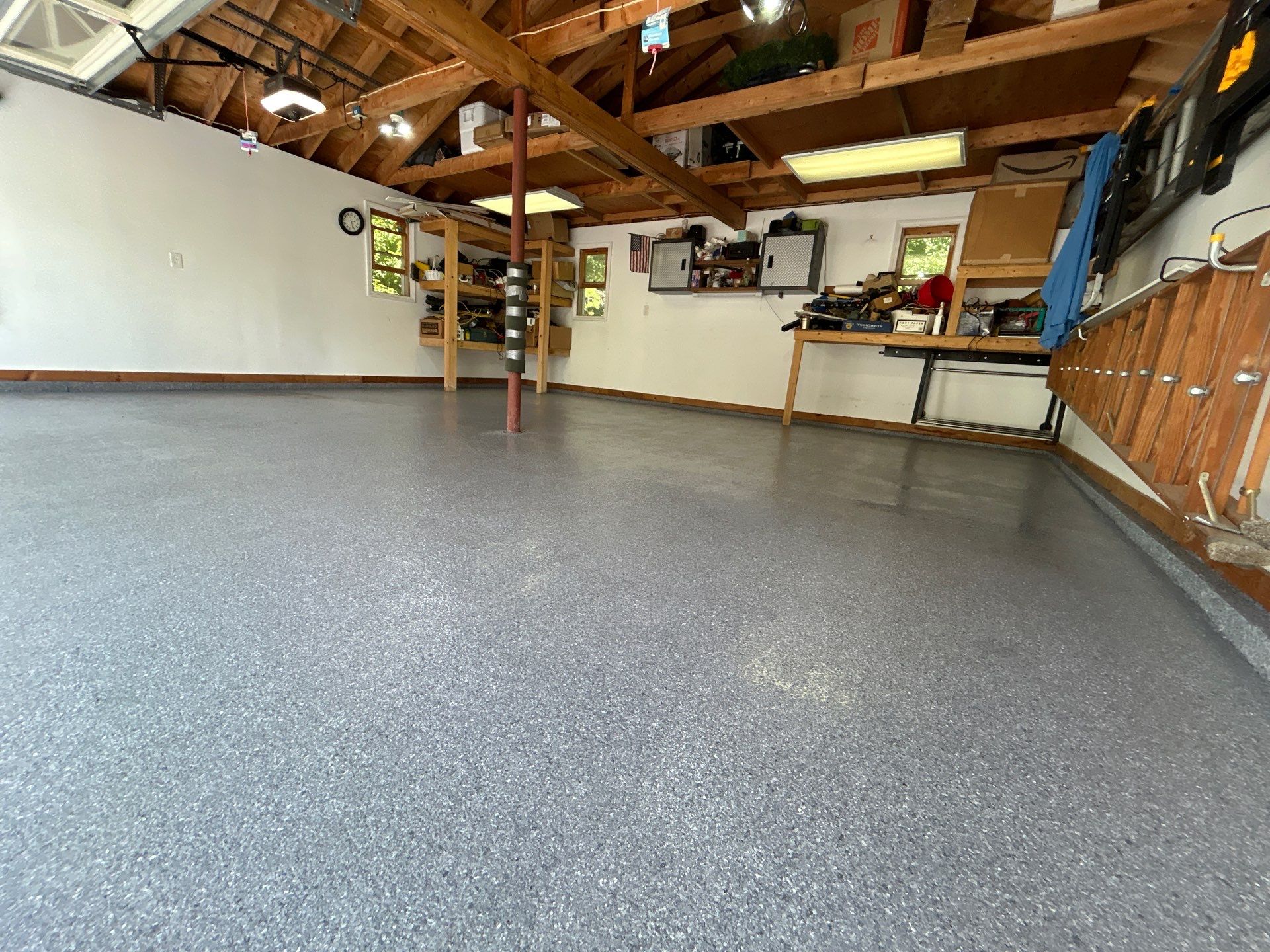 Garage in Londonderry, NH 03053 by Symphony Concrete Coatings