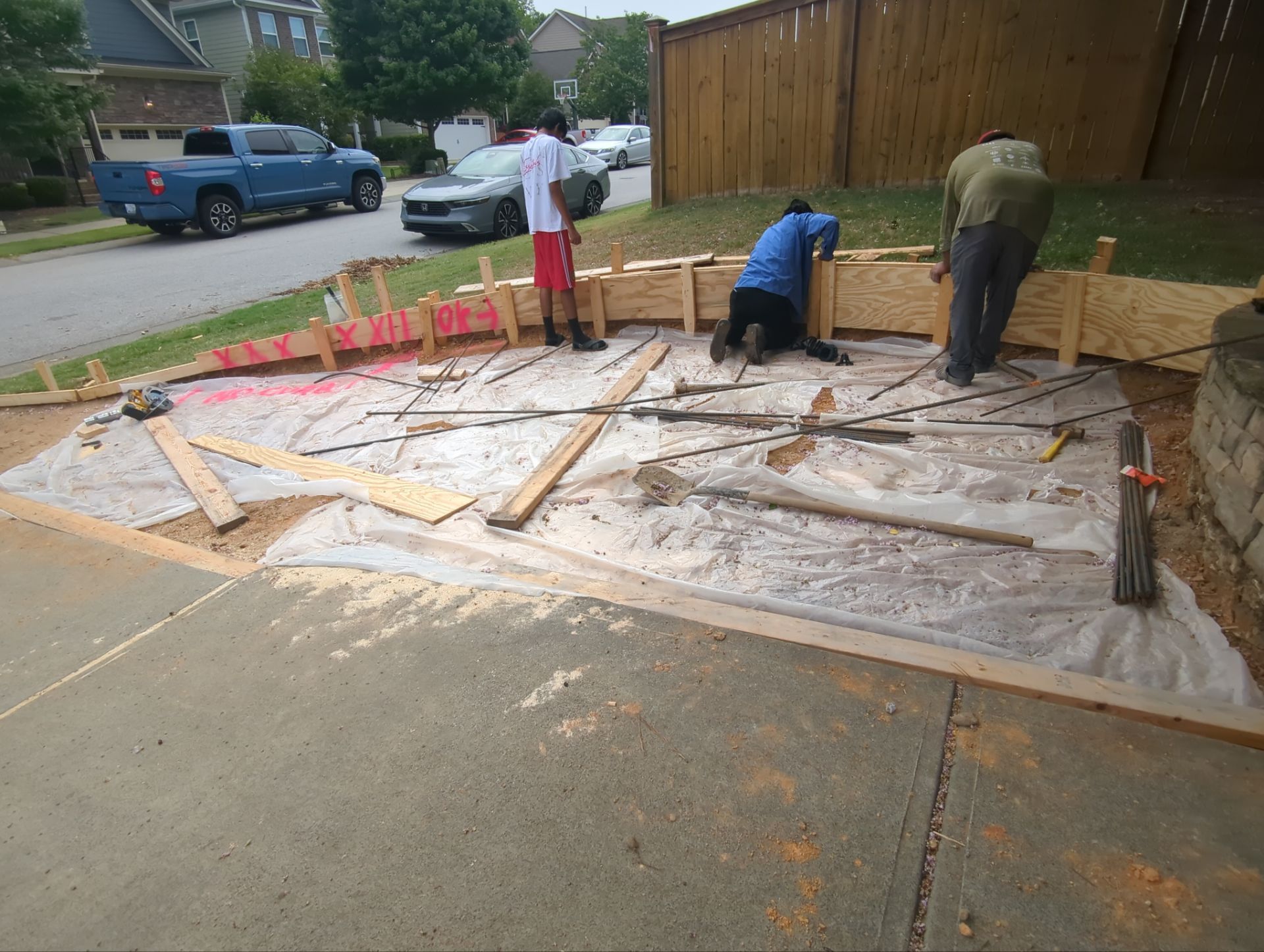 Concrete Driveway Expansion & Retaining Wall | Apex, NC by Elite Remodeling and Design LLC